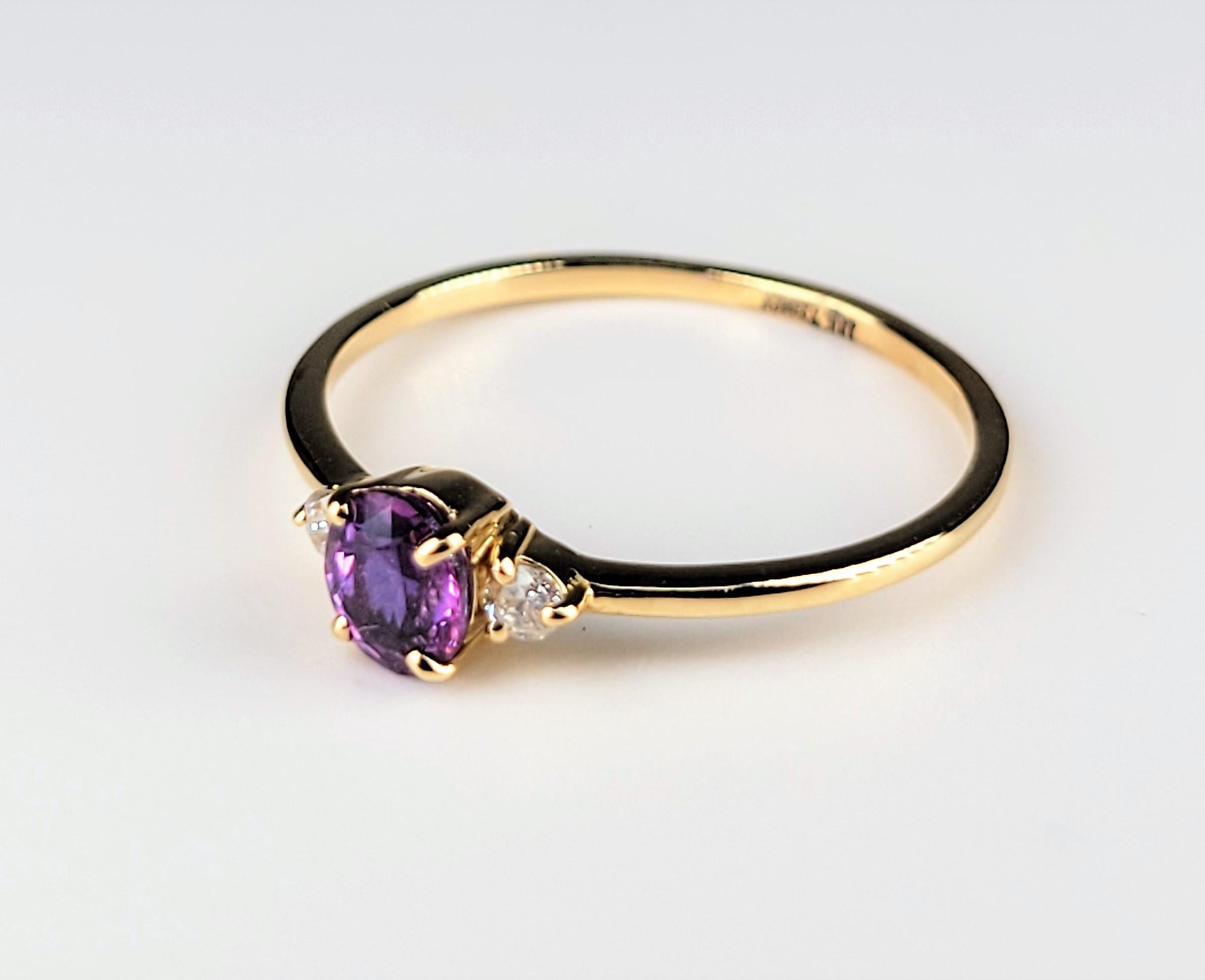 Oval Cut Pink Tourmaline Diamond Ring in 18 Karat Yellow Gold For Sale
