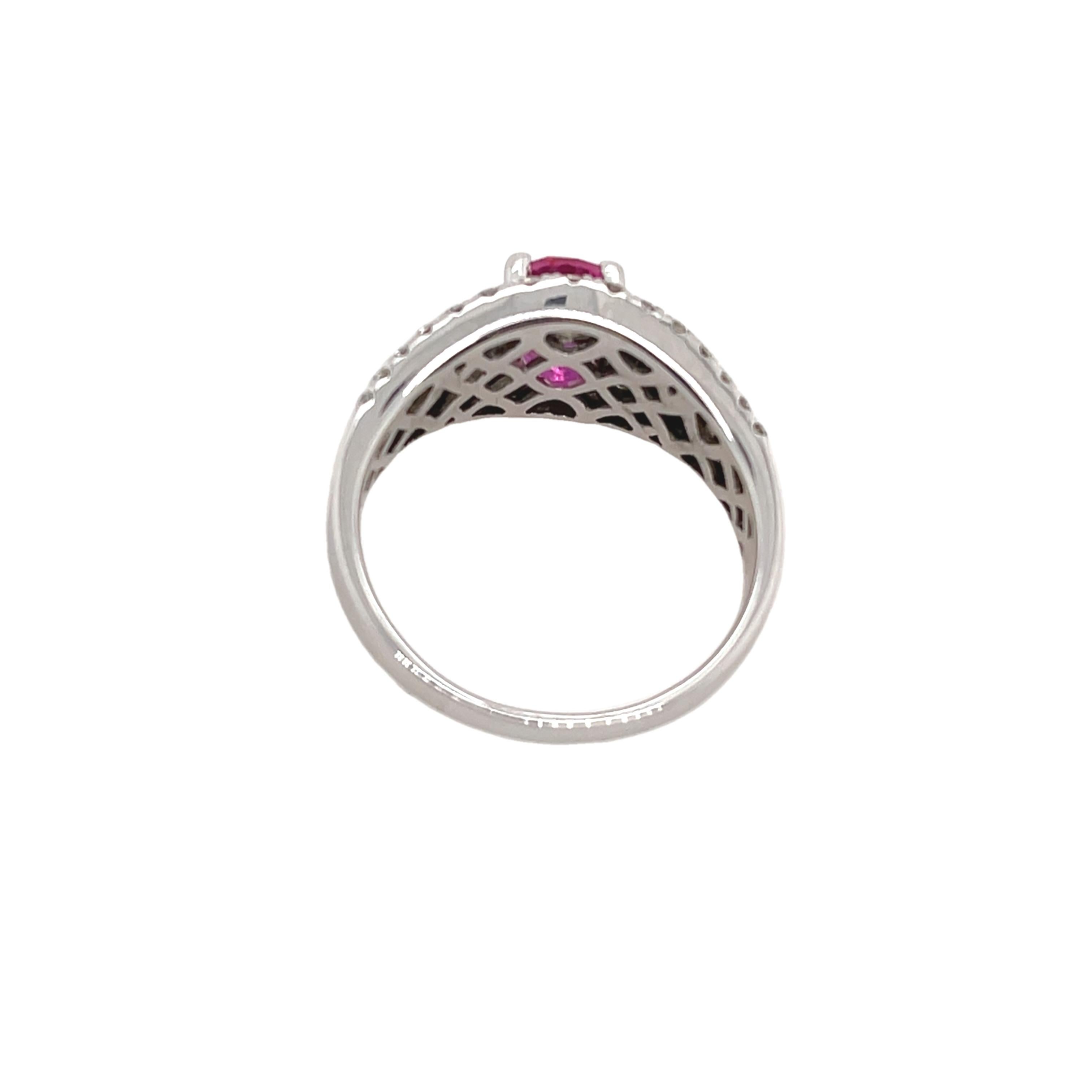 This stunning oval pink tourmaline and diamond ring 
is set in luxurious 18ct white gold. The vibrant, deep pink tourmaline is the centerpiece, surrounded by sparkling diamonds that accentuate 
its beauty. 

Total Diamond Weight: 1.15ct
Diamond