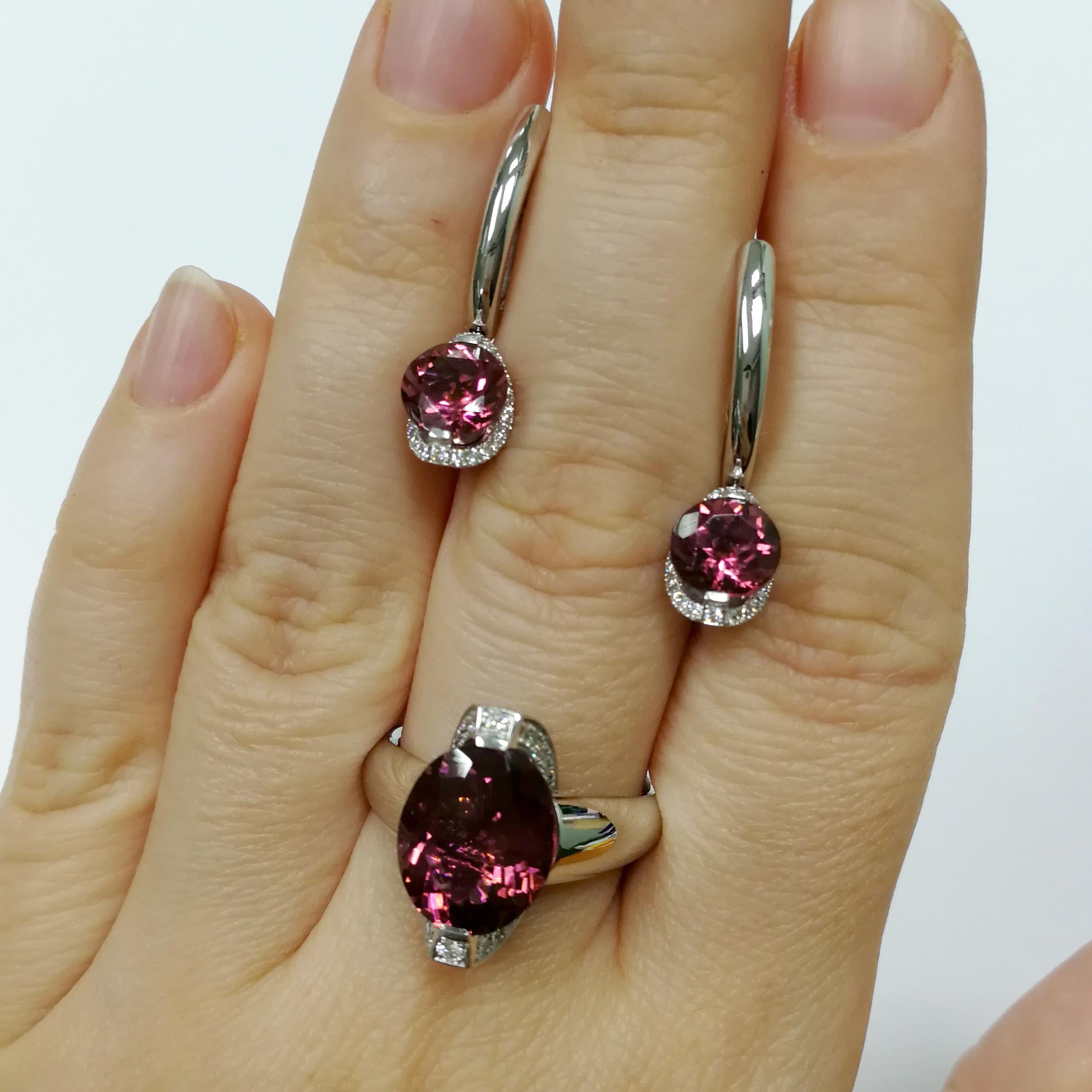 Pink Tourmaline Diamonds 18 Karat White Gold Moon Suite
When you look at this Suite, there are some absolutely cosmic associations. And there is a reason for this. The central Hot Pink Tourmalines 