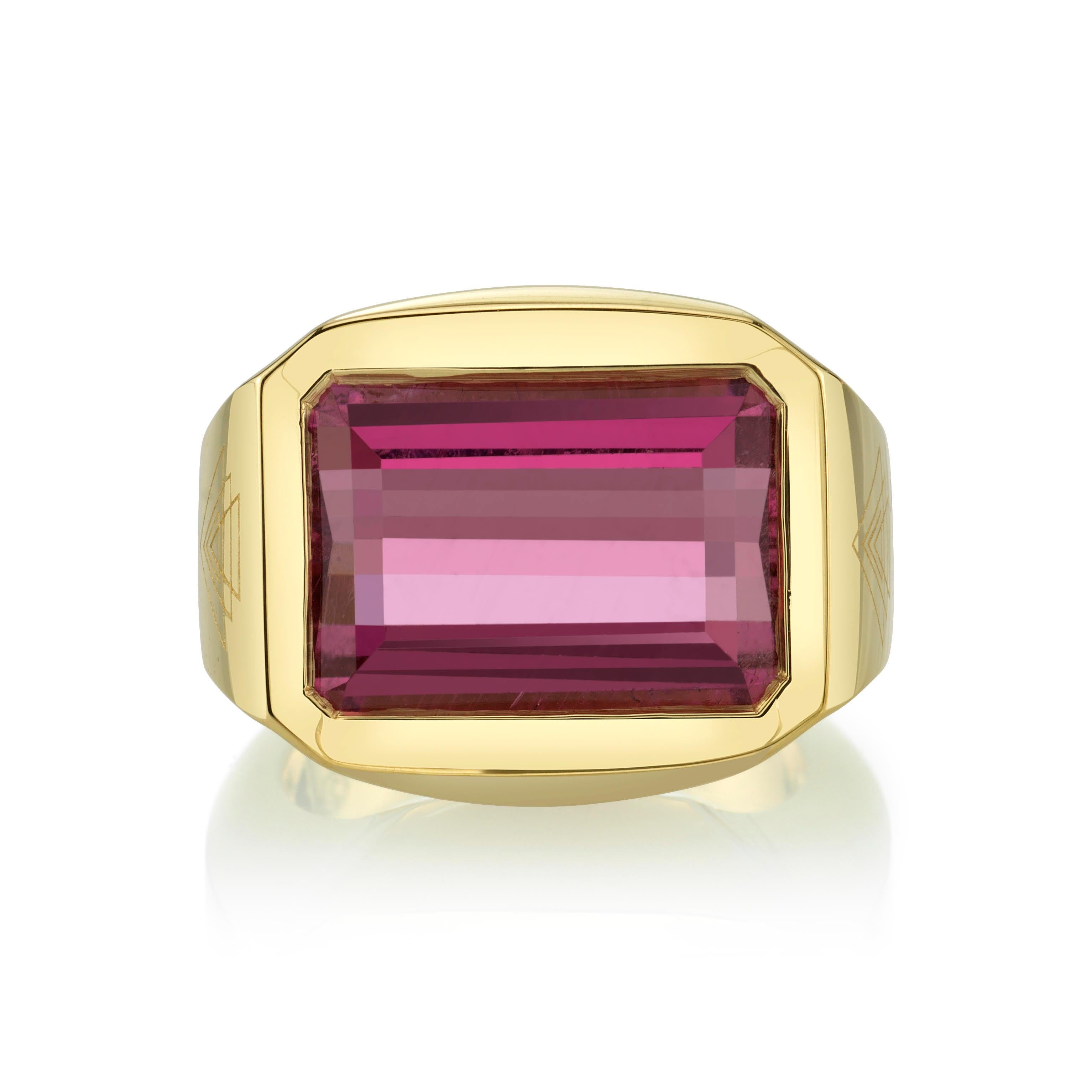 This Ring is handcrafted in 18-karat yellow gold with an emerald-cut Pink Tourmaline that is 5.4 Carats.
This Ring is one-of-a-kind and is a size 3.5. 
This Ring has meaningful engravings on the sides. One side of this Ring ( Triangle pointing down)
