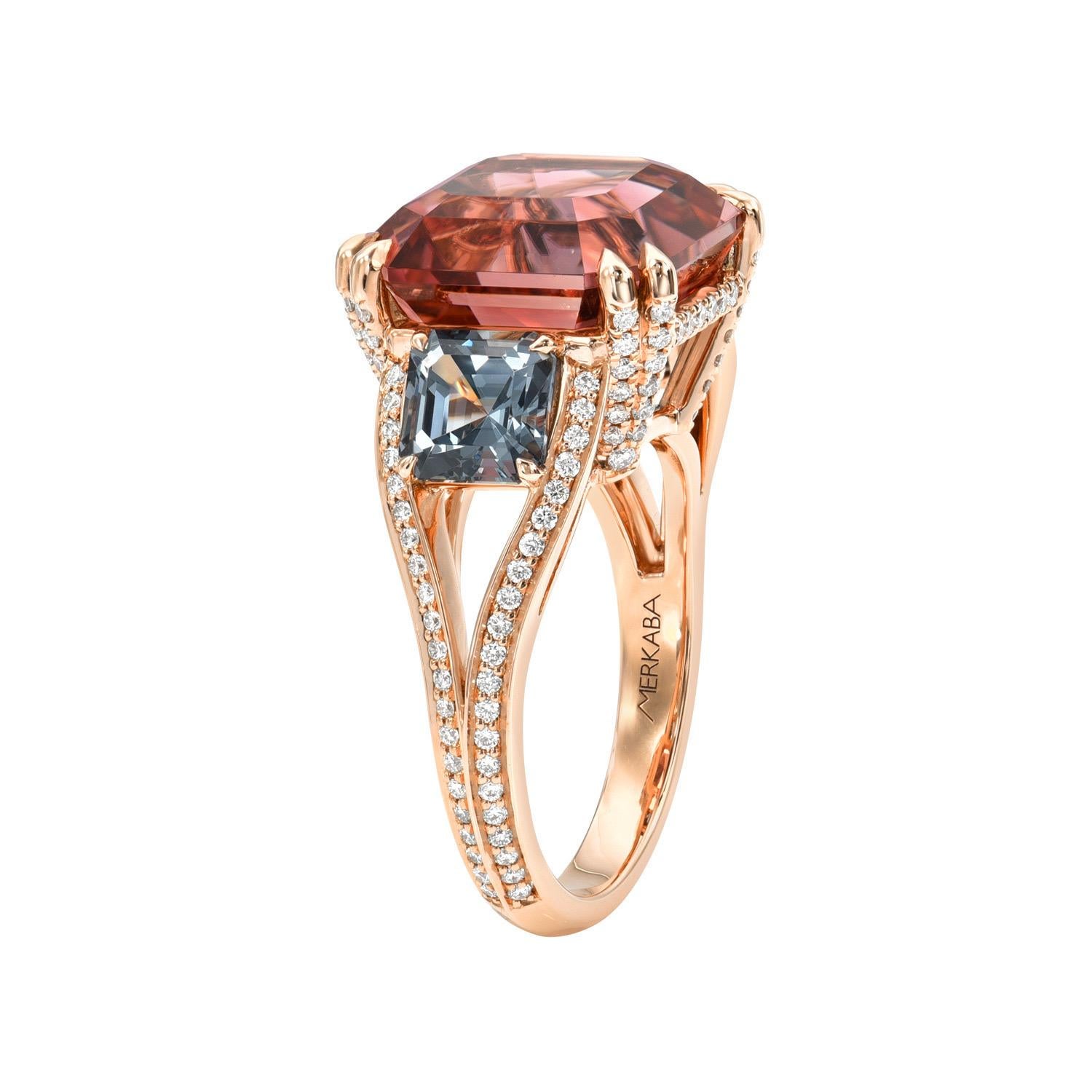 Magnificent 18K rose gold ring set with a statement 10.08 carat Pink Tourmaline square emerald-cut, flanked by a remarkable pair of 1.96 carat Grey Spinel square emerald-cuts, and a total of 0.48 carat round brilliant diamonds.
Ring size 6.5.