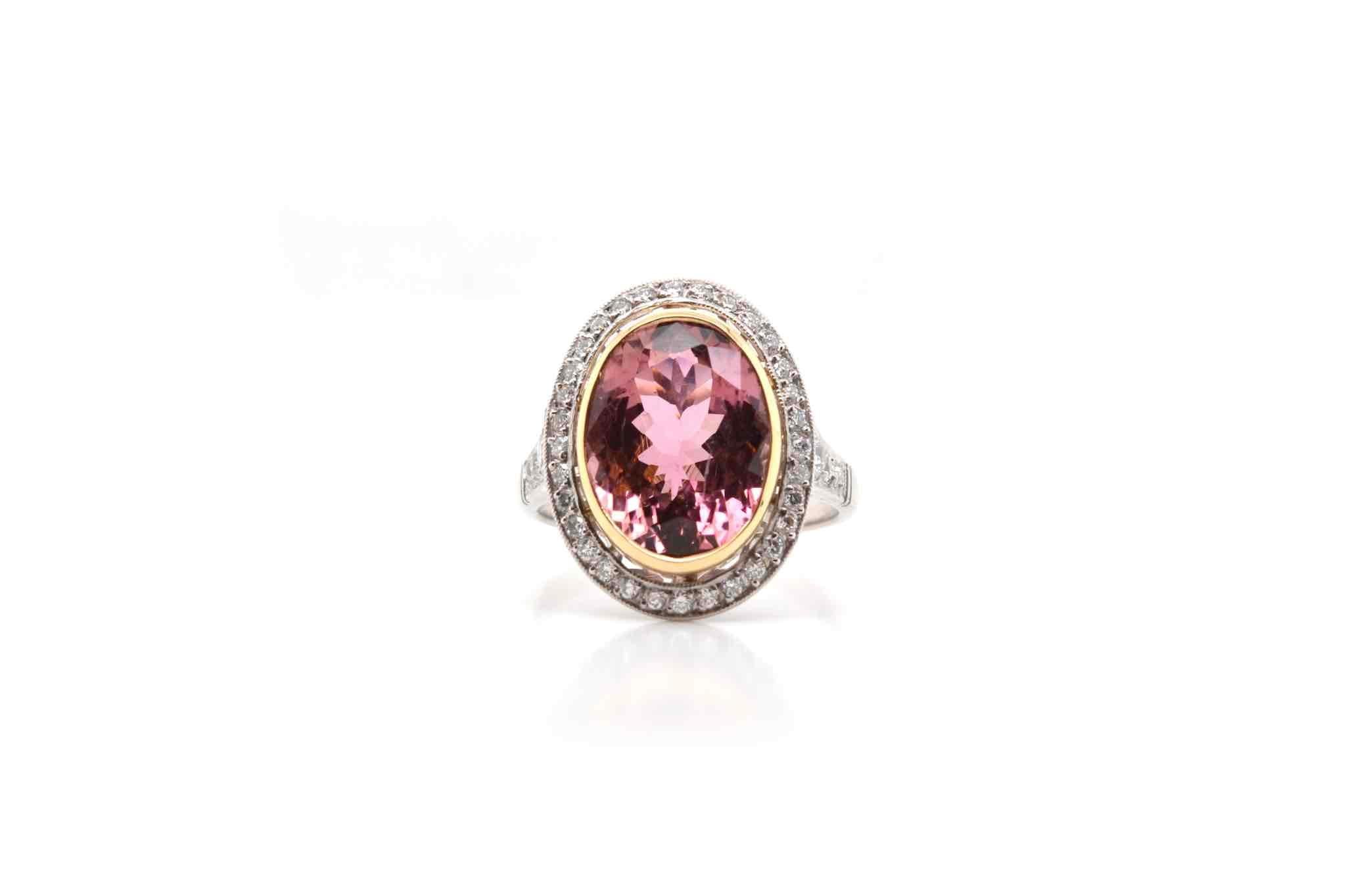 Stones: Pink tourmaline of 6.69 carats
and brilliant cut diamonds for a total weight of 0.35 carats.
Material: Platinum and 18k yellow gold
Dimensions: 19 mm length on finger
Weight: 7.2g
Size: 54 (free sizing)
Certificate
Ref. : 24454 / 24223