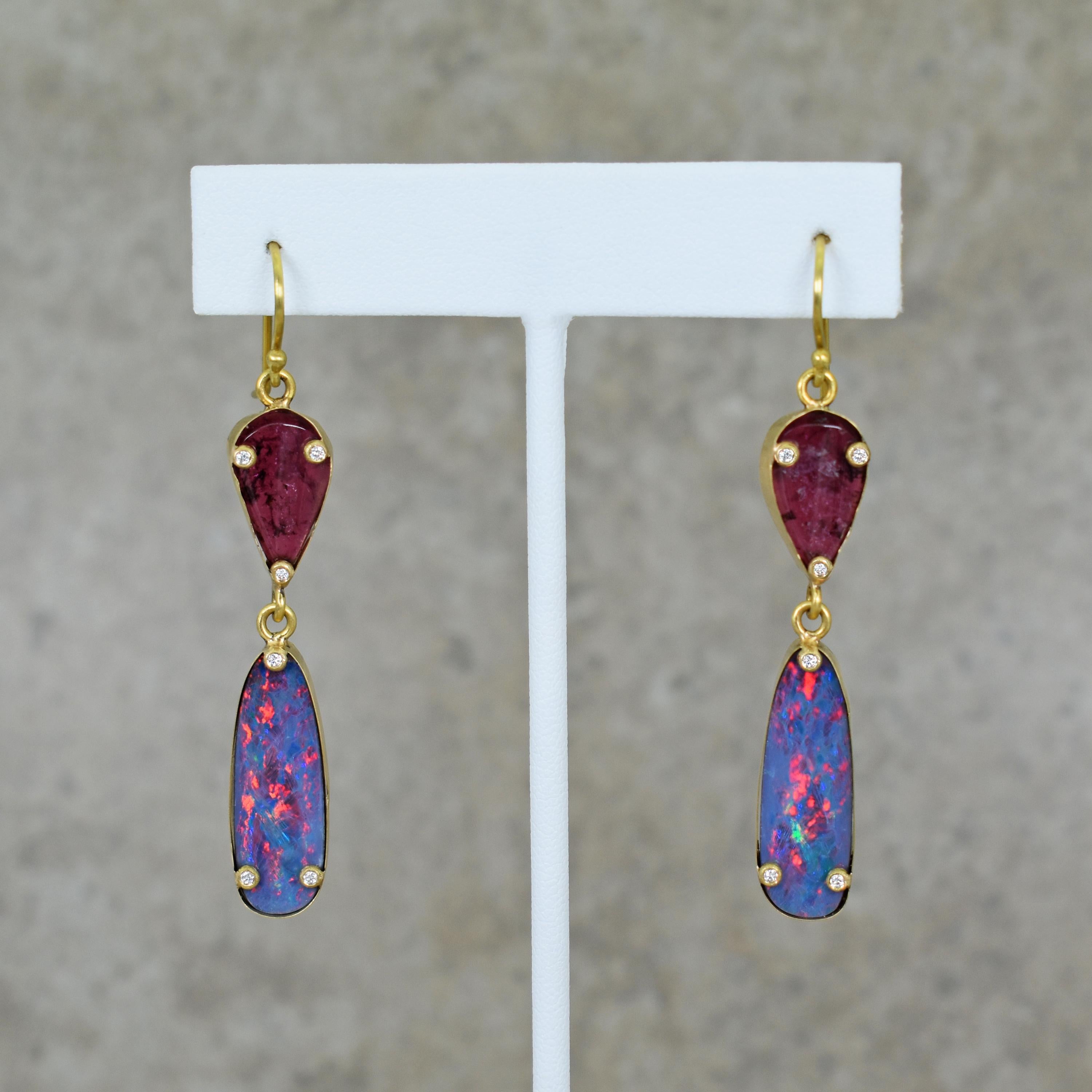 Russian Pink Tourmaline, Australian Boulder Opal and accent white Diamond (0.18 total carats, G-H, SI1) 18k yellow gold dangle earrings. Dangle earrings are 2.5 inches in length. Gorgeous Tourmaline and Opal gemstones in these contemporary earrings.