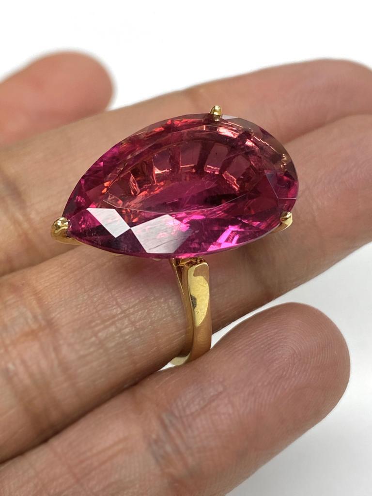 Pink Tourmaline Pear Shape Ring in 18K Yellow Gold, from 'G-One' Collection

Stone Size: 24.4 x 16.6 mm

Approx. Wt: 16.79 Carats (Pink Tourmaline) 