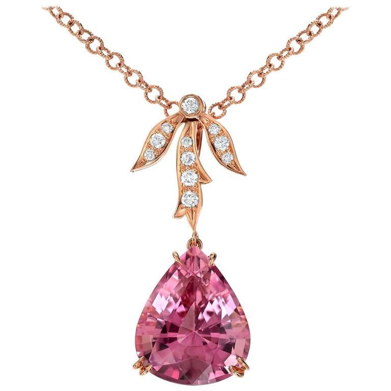 A gorgeous pear shaped 10.87 carat Baby Pink Tourmaline is set in a 0.25 carat diamond necklace. This Pink Tourmaline pendant necklace is crafted in 18K rose gold.
Returns are accepted and paid by us within 7 days of delivery.

Color alternatives