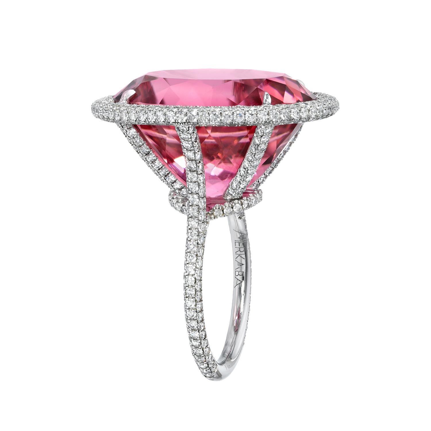 World-class 29.79 carat flawless vivid Pink Tourmaline oval platinum ring, decorated with impeccably, micro-set collection diamonds (D-F/VVS-VS1), weighing a total of 1.91 carats. 
Ring size 5.75. Resizing is complimentary upon request. 
Returns are