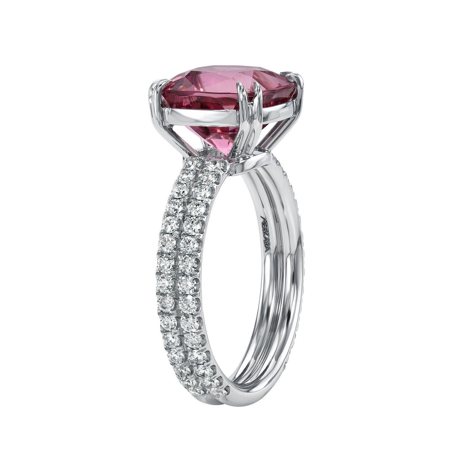 3.93 carat Hot Pink Tourmaline cushion platinum ring decorated with a total of 0.75 carat round brilliant collection diamonds.
Ring size 6. Resizing is complementary upon request.
Crafted by extremely skilled hands in the USA.
Returns are accepted