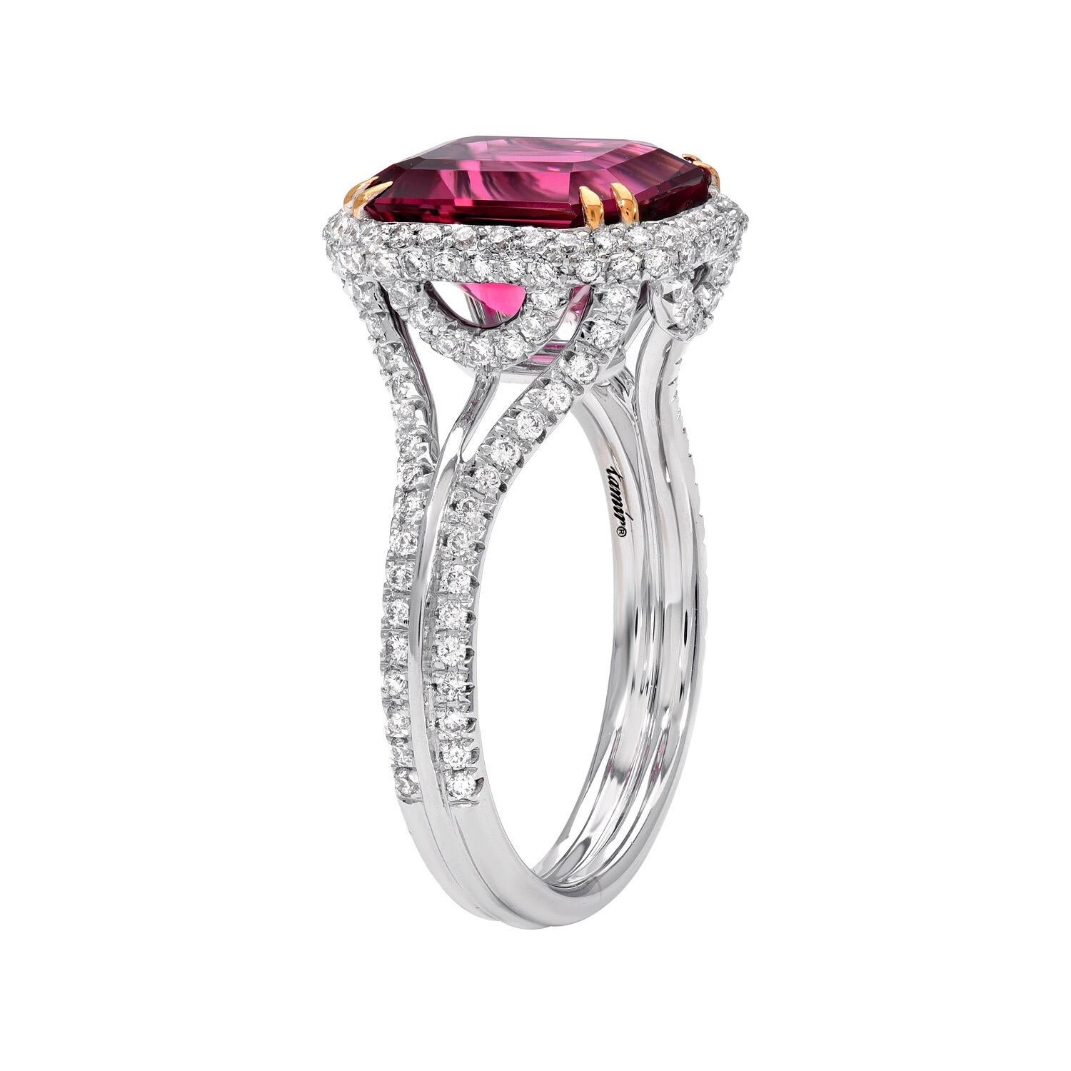 3.48 carat emerald cut reddish Pink Tourmaline (also known as Rubellite), is hand set in this fantastic 18K white gold ring, secured by 18K yellow gold prongs, and adorned by a total of 0.63 carat round brilliant diamonds.
Ring size 6.5. Re-sizing