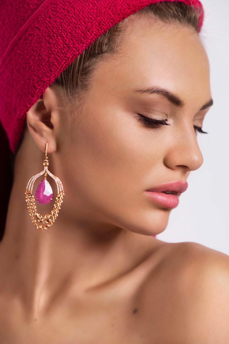 Gentle pink tourmaline set in bright rose gold is an example of real femininity and sparkling youth.
Shining beauty and elegance are the extra effects you get with these earrings to complement your  natural allure.

Diamond 14-RND-1.14