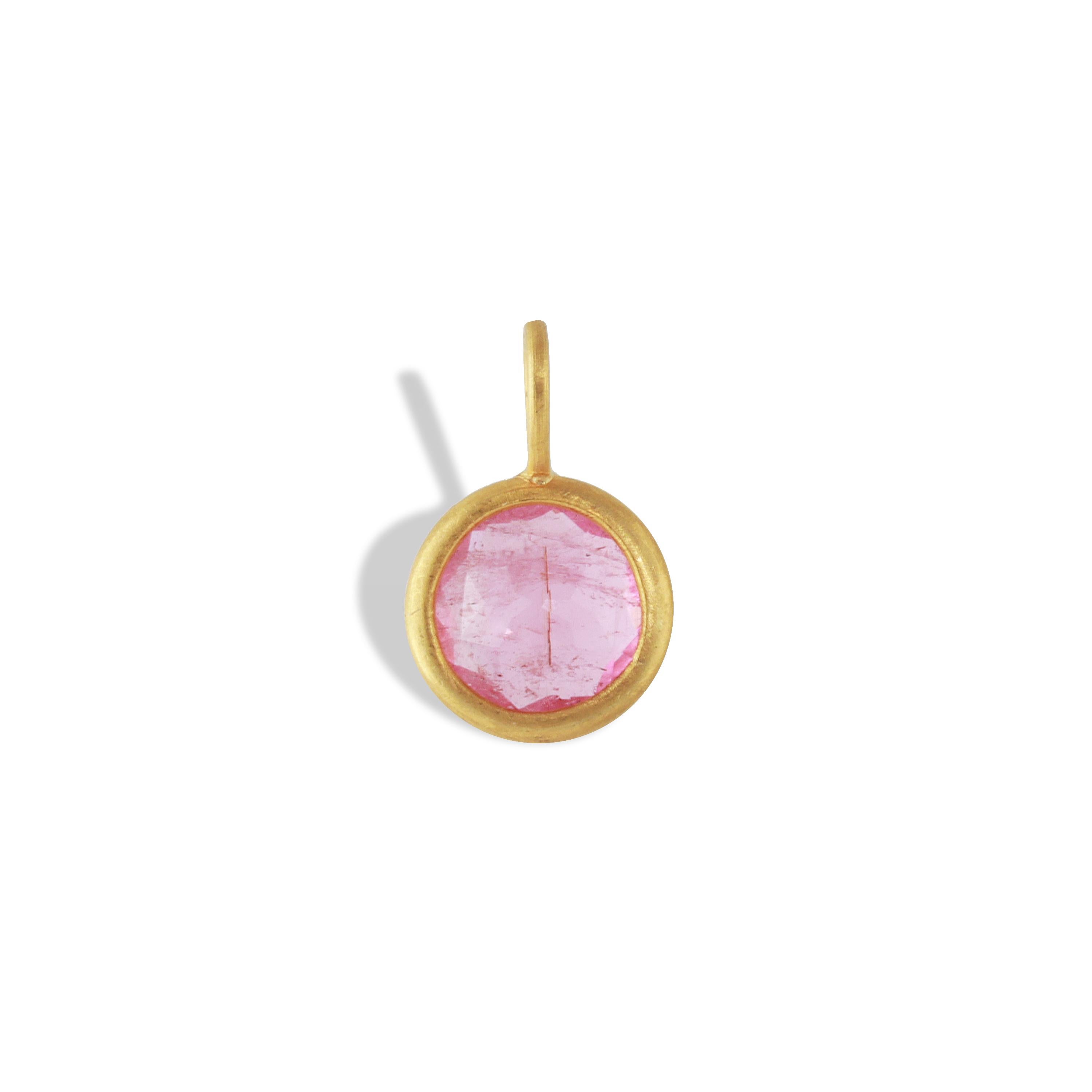A 1.56 carat bright Pink tourmaline pendant set in 22k gold.  Simple and beautiful.

Wearing Pink Tourmaline throughout the day helps release stress, worries, depression and anxiety.  Like most heart based stones, the vibration of pink tourmaline