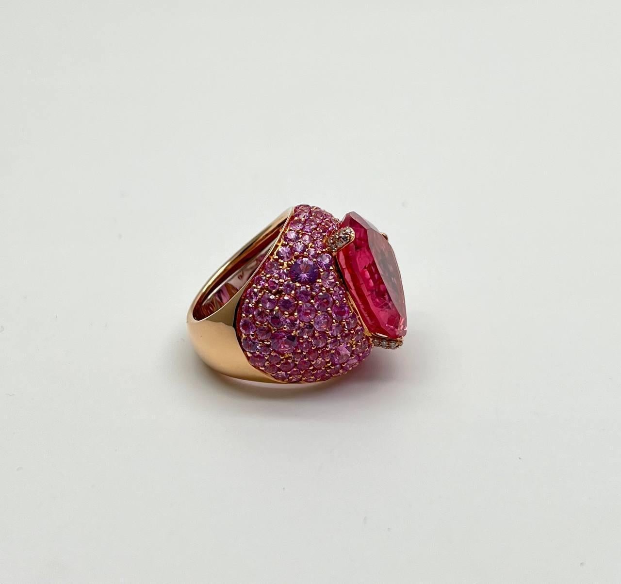 Exquisite Craftsmanship and Vibrant Elegance. Set with a Large Pink Rubellite Tourmaline

Accented by Pavé Pink Sapphires and Diamonds.

18K Rose Gold