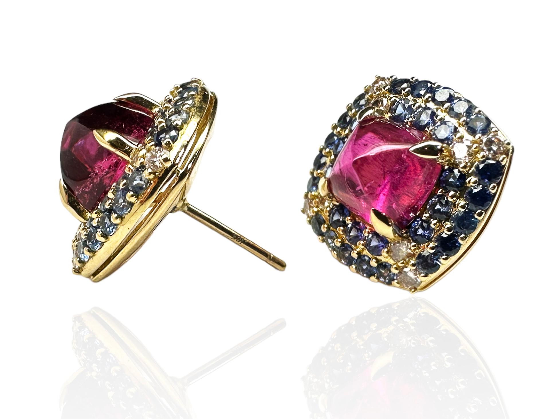 Pink Tourmaline Sapphires Argyle Pink Diamonds 18k Gold Stud Earrings. Including 4ctw hot pink tourmaline princess pinicle cut gemstones, surrounded by 1.66ctw blue sapphires and 0.33ctw Argyle pink rose diamonds. 