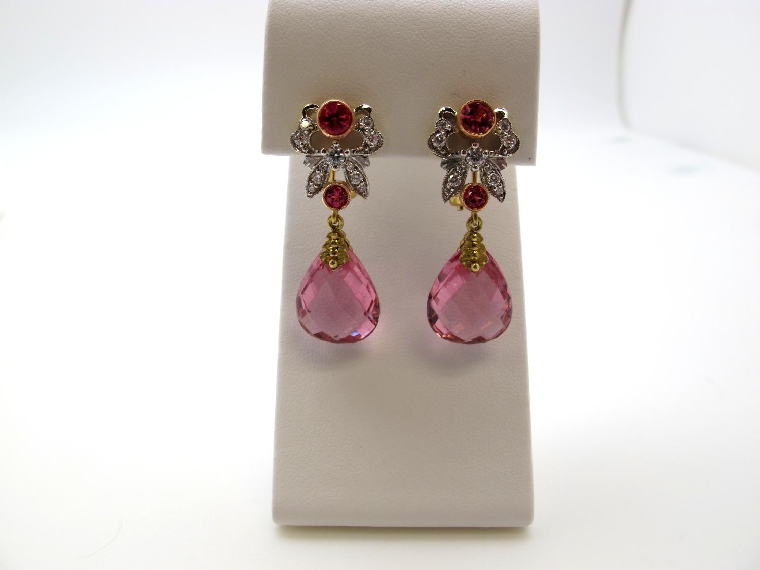 Pretty in Pink! Faceted, briolette cut, pink tourmalines are featured in these beautiful earrings. They are exceptionally rare because of their size and fine quality. The tourmalines are accented by pink spinels and diamonds. These earrings are true
