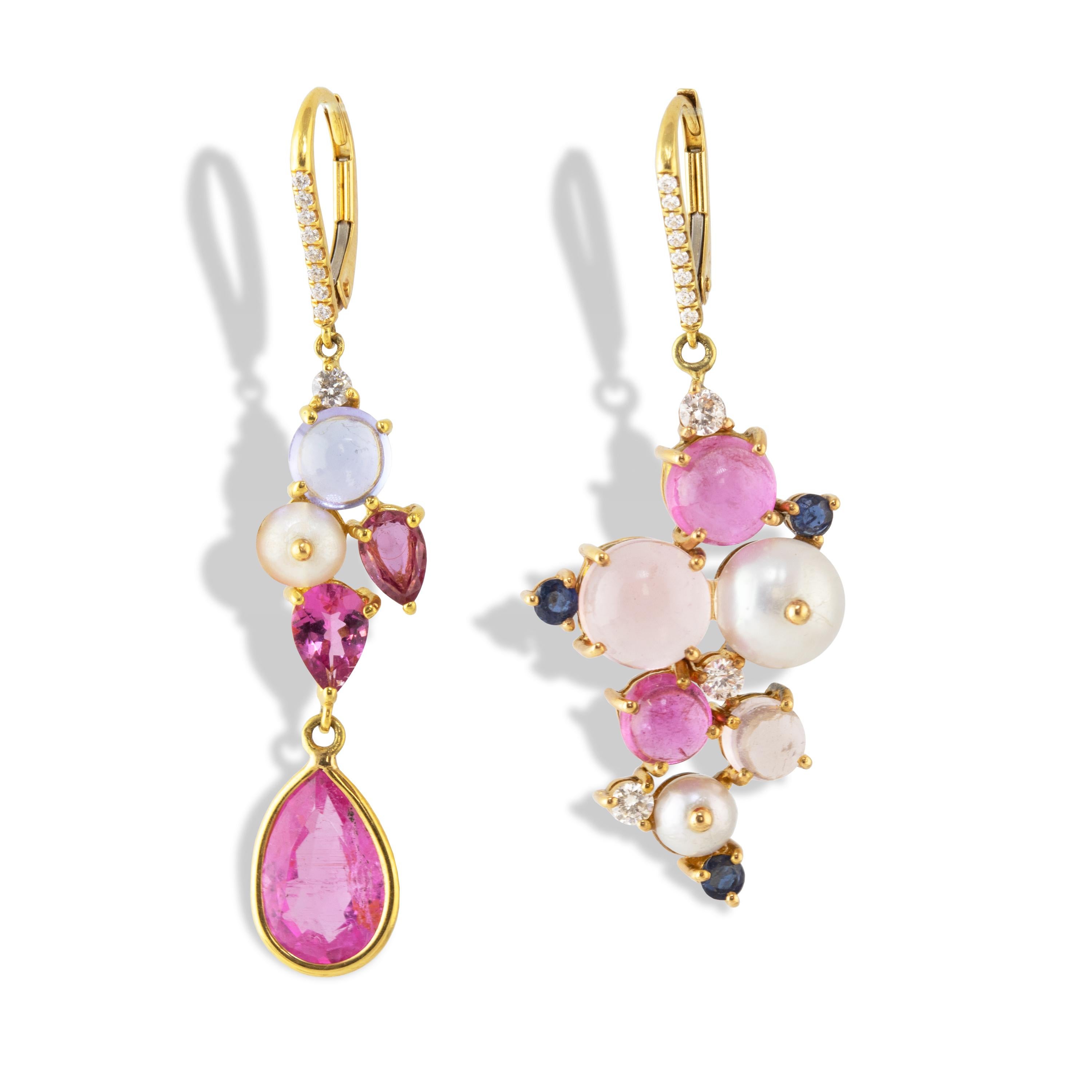 A pair of asymmetrical cluster earrings featuring Pink tourmaline, Tanzanite, Diamonds, Sapphires and Pearls and set in 18k gold. 

One earring features a 3.08 carat Pink tourmaline pear drop hangs from a cluster which includes 2 smaller faceted