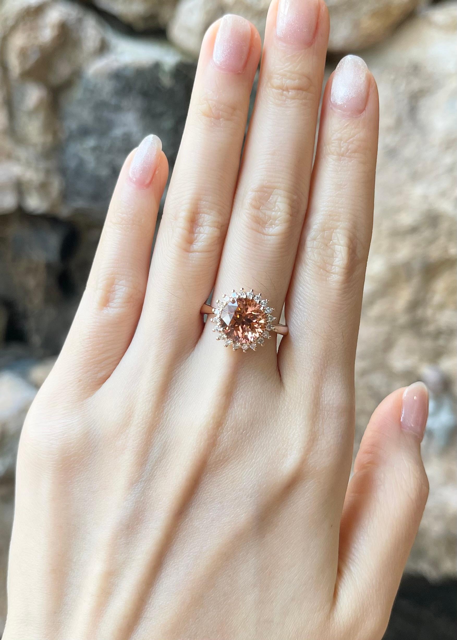 Pink Tourmaline 3.10 carats with Brown Diamond 0.29 carat Ring set in 18K Rose Gold Settings

Width:  1.4 cm 
Length: 1.4 cm
Ring Size: 53
Total Weight: 6.99 grams

