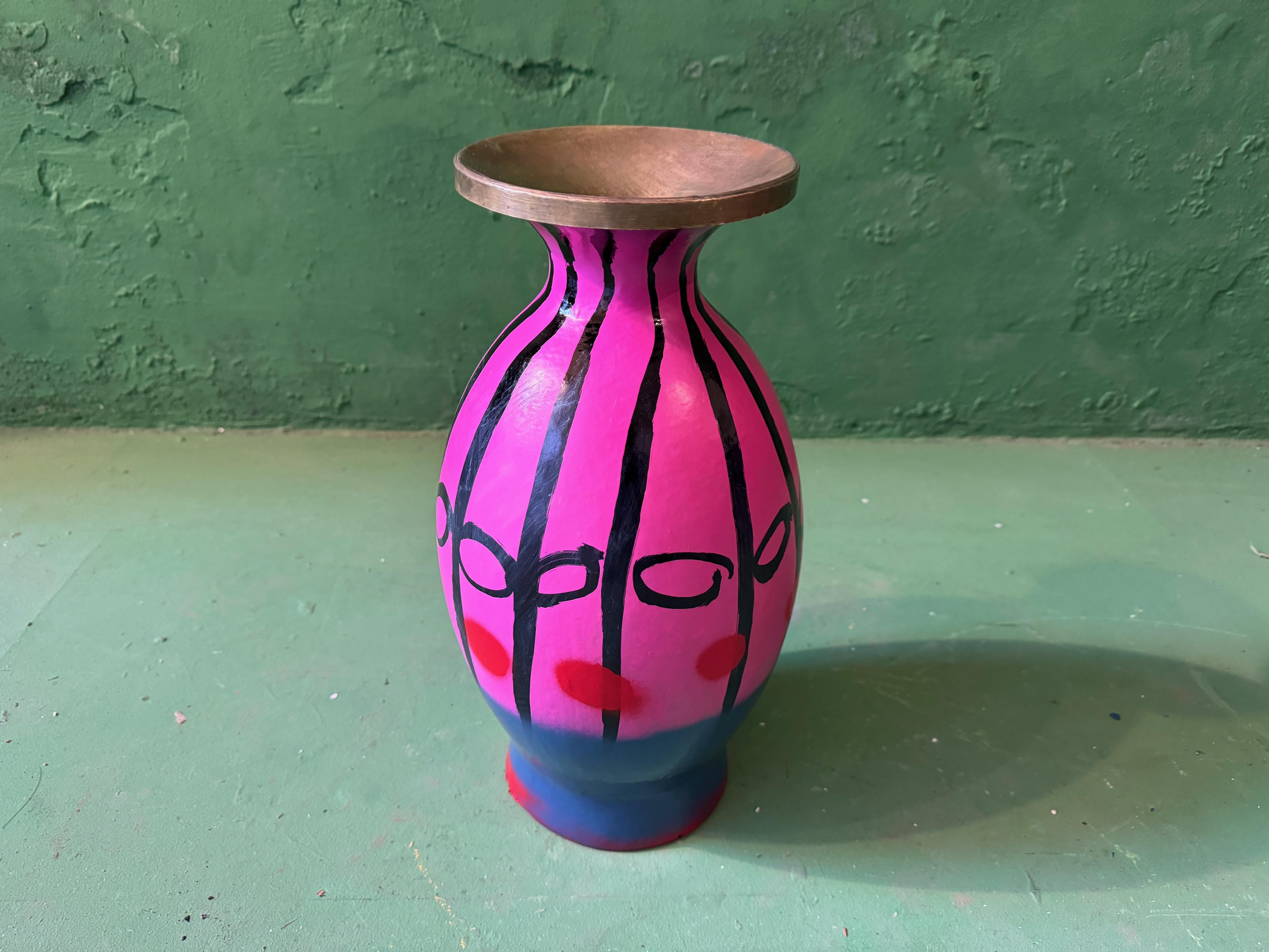 Indian paper Mache Vase with a brass inlay for your flowers in the morning.

Painted by the artist

Dutch workchair, ceramic backrest added, painted and multi lacquered. Adjustable.

•	Info about Markus
•	born 1964 in Aschaffenburg, Germany
•	since 