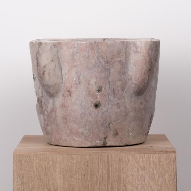 18th Century Pink-Lilac Veined Marble Mortar
A substantial and beautifully sculpted marble mortar dating to the 18th century. Carved from a single block of richly colored marble, the surface displays striking pink-lilac tones blended with soft cream