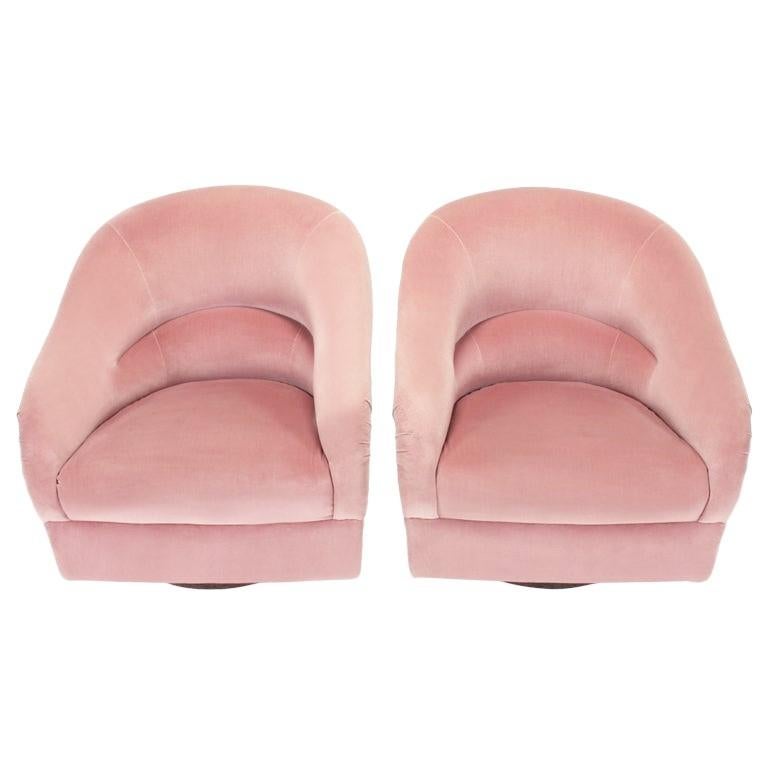 Sleek and sculptural pair designed by Ward Bennett lounge chairs professionally reupholstered in soft pink velvet.