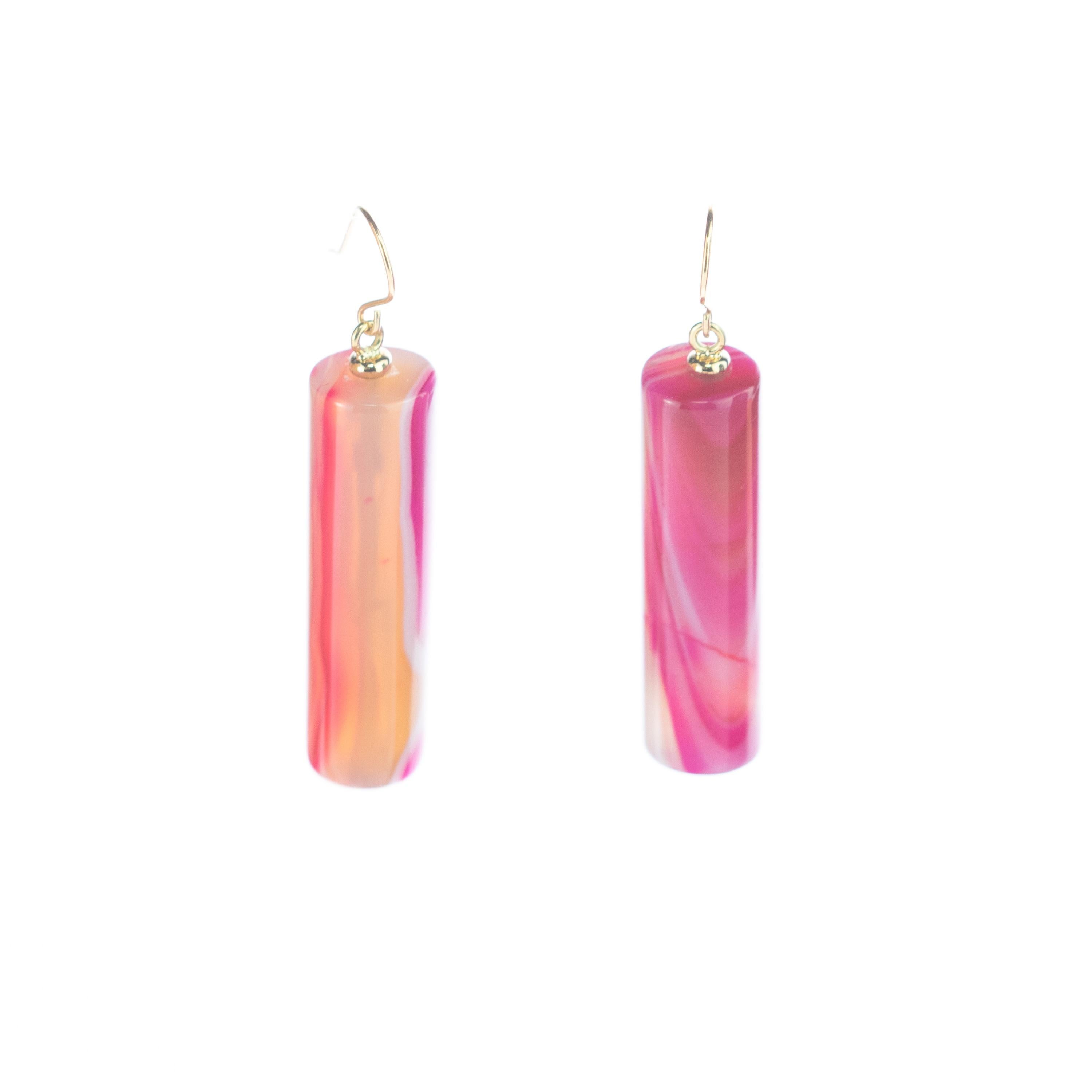 This stunning masterpiece with high quality craftsmanship was born in the Intini Jewels workshop. Our designers add all the italian modern style and glamour in one exquisite piece. Stunning Agate dangle tubes hanging from 18 karat yellow gold.

Pink