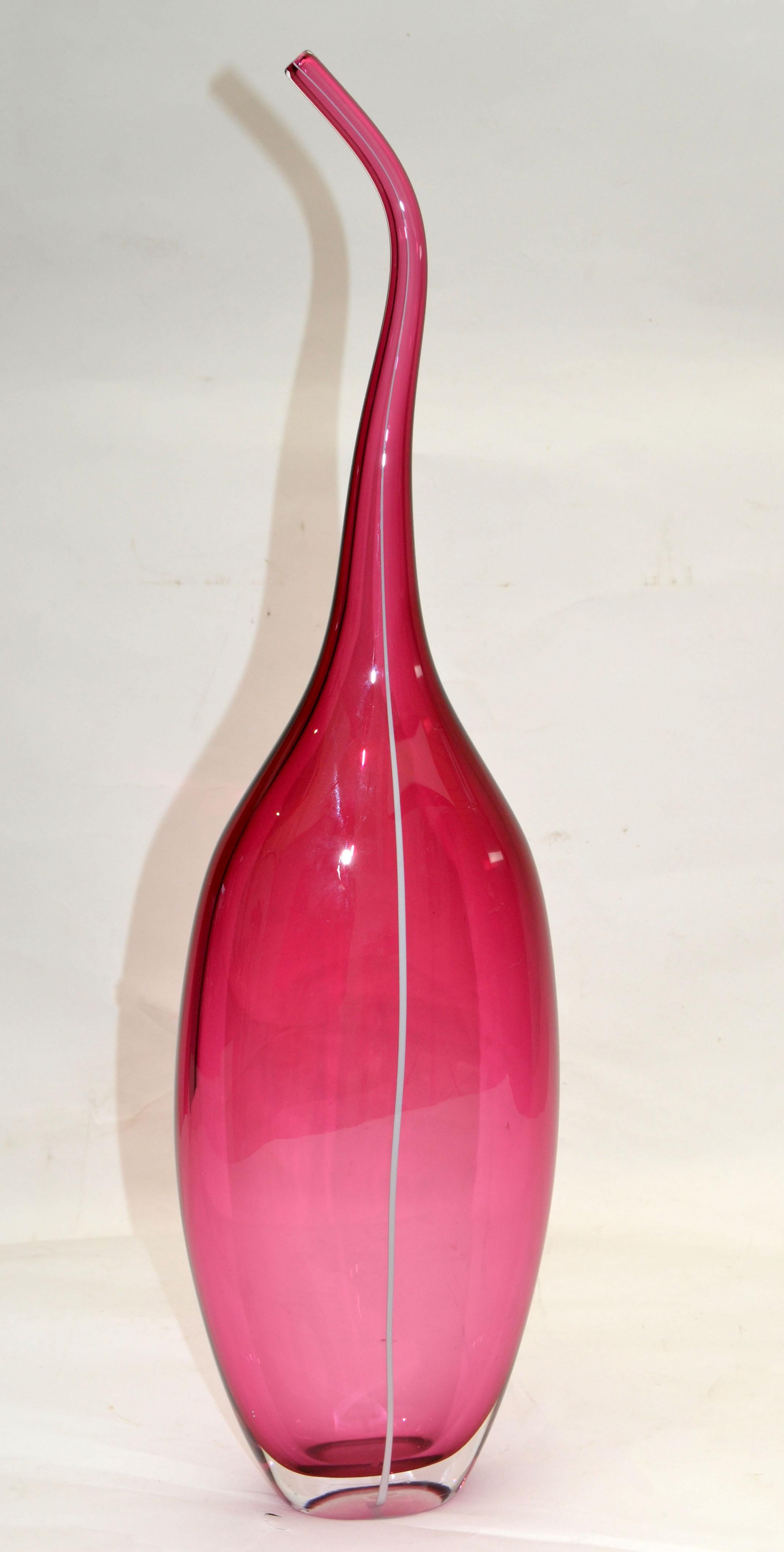 Elegant Tall Mid-Century Modern sculptural hand-blown Murano art glass vase in pink with white line inserted. 
The vase is heavy.
Simply lovely.