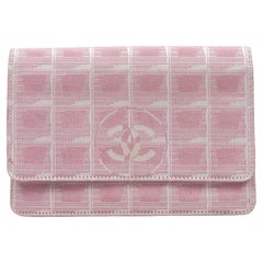 Portafoglio da viaggio della linea Chanel rosa e bianco