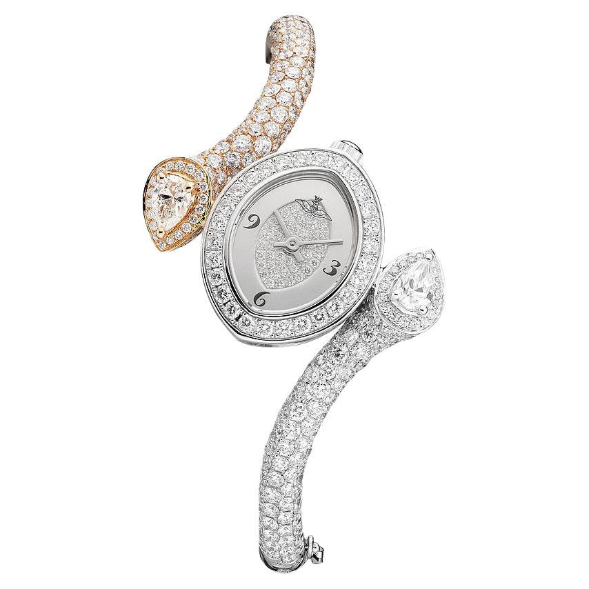 Montre en or rose et blanc avec diamants en vente