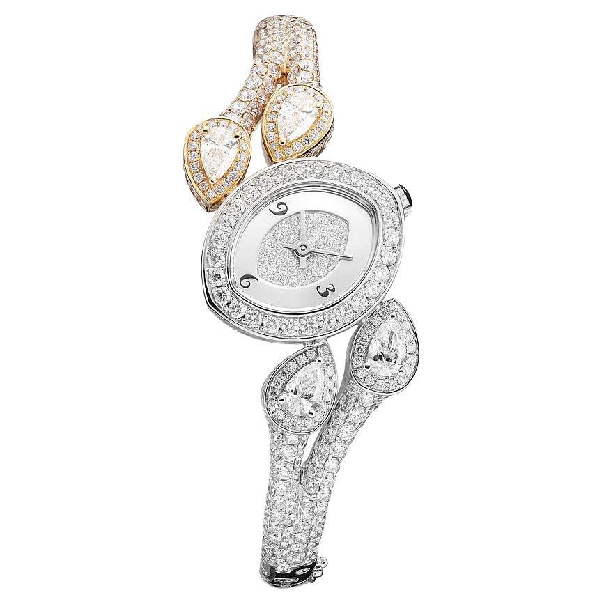 Montre en or rose et blanc avec diamants