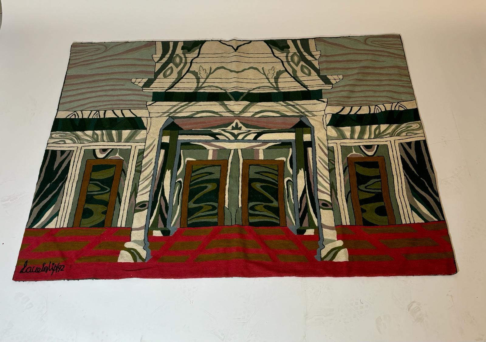 Tapisserie en laine enveloppée conçue par Nanda Vigo. Signalé la signature de l'artiste en bas à gauche. Sans support en fer pour la suspension. Sans support en fer pour la suspension.

Biographie
Après avoir obtenu son diplôme à l'Institut