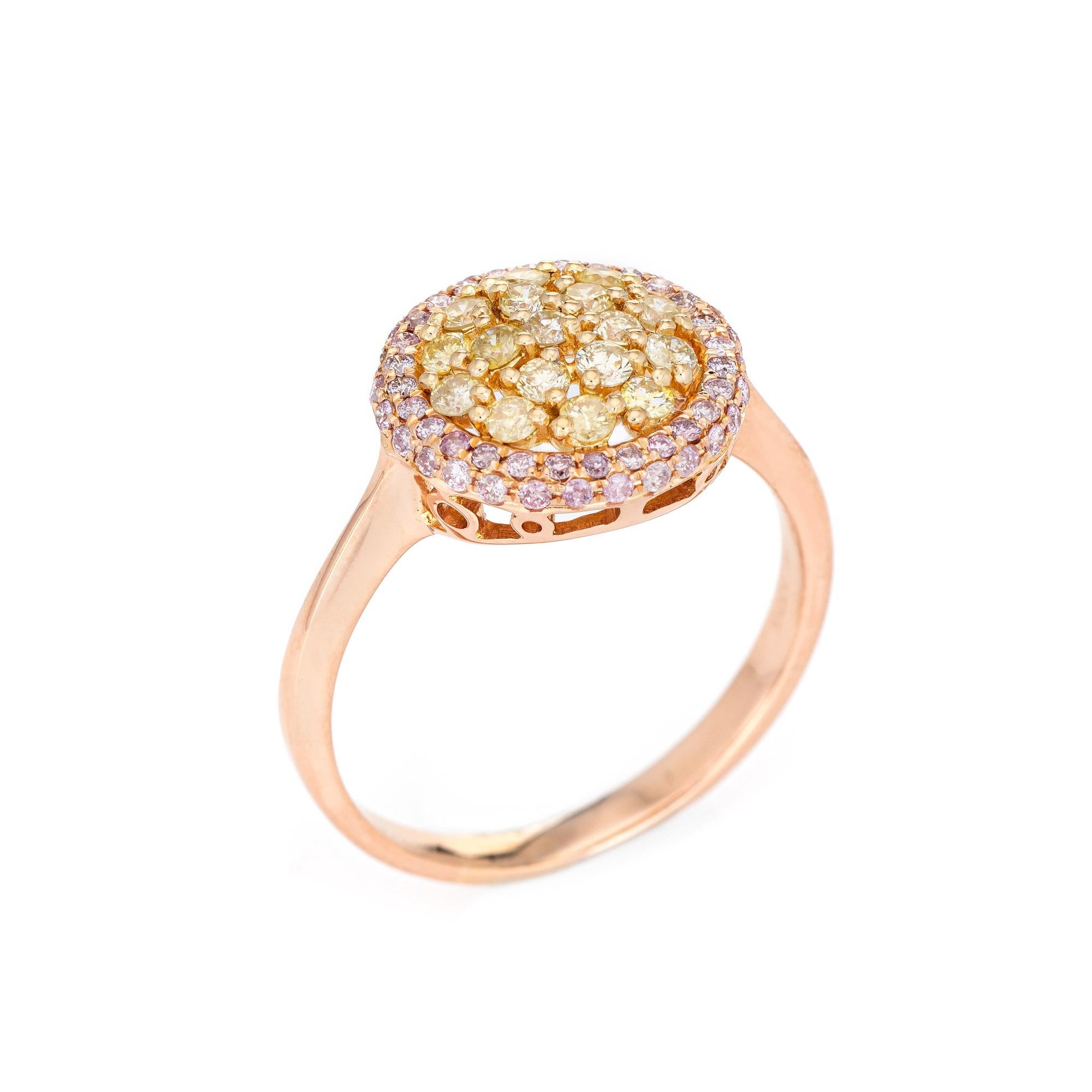 Stylish pink & yellow diamond ring crafted in 18 karat rose gold. 

17 yellow diamonds total an estimated 0.60 carats, accented with 55 pink diamonds totaling an estimated 0.27 carats. The diamonds are estimated at SI1-2 clarity.  

The halo ring