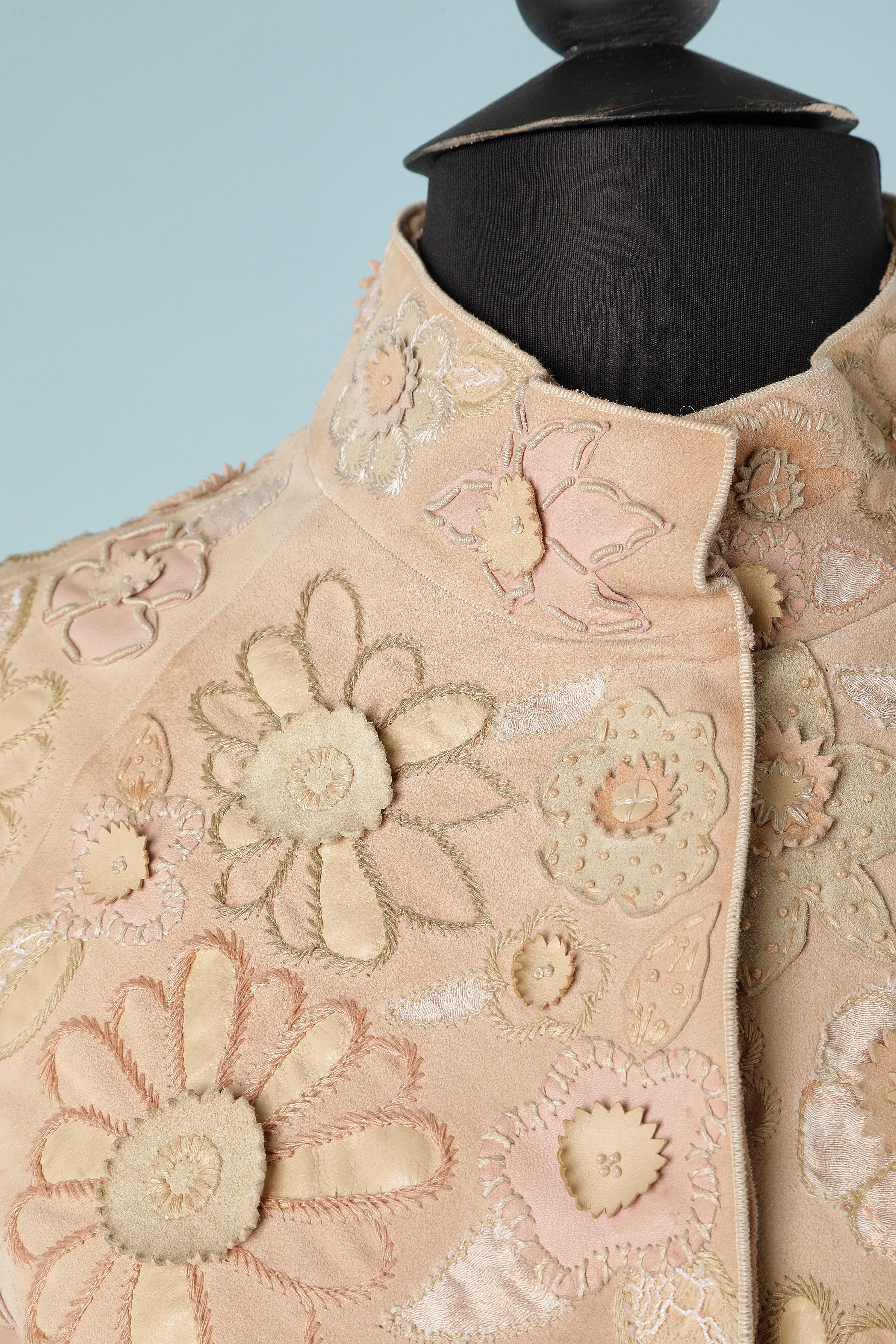 Pinkish beige suede jacket with suede, leather, silk lurex  flowers appliqué and threads embroideries. Raglan sleeves. Silk chiffon lining and silk satin ribbon piping on the bottom edge inside , on the snap placket and inside the sleeve edge. Snap