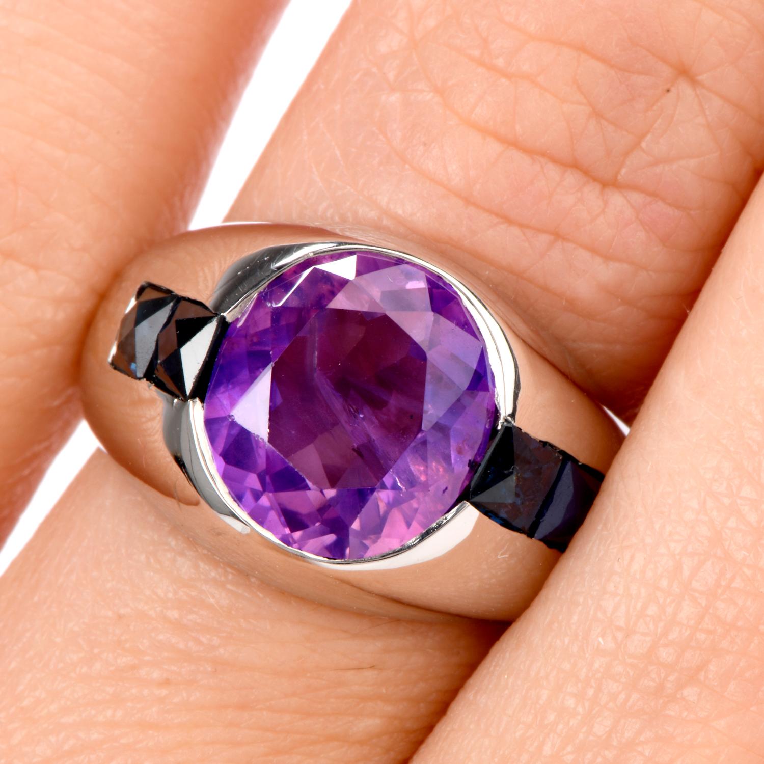 This is a perfect ring for Men, it weight heavy 22.1 grams of solid Platinum is weighted further by 

the Genuine Pinkish Purple Round Sapphire in the center, approx. 4.45 carat, Bazel set

with 2 rectangular faceted Blue Sapphire channel set