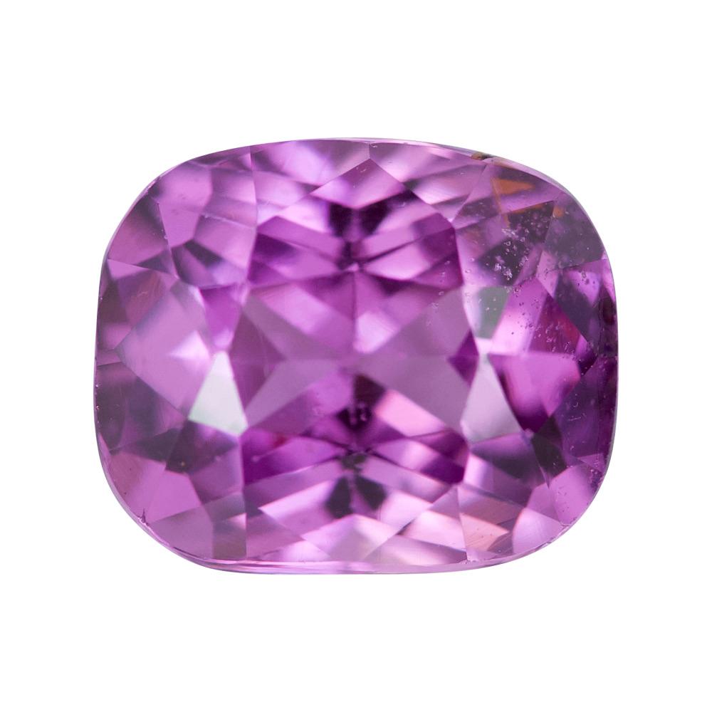This extraordinary natural 1.19 ct pinkish purple Madagascan sapphire boasts a rare and vivid hue, expertly fashioned into a cushion shape with a myriad of sparkly facets. For the individual wanting a unique and vibrant gemstone this is the sapphire