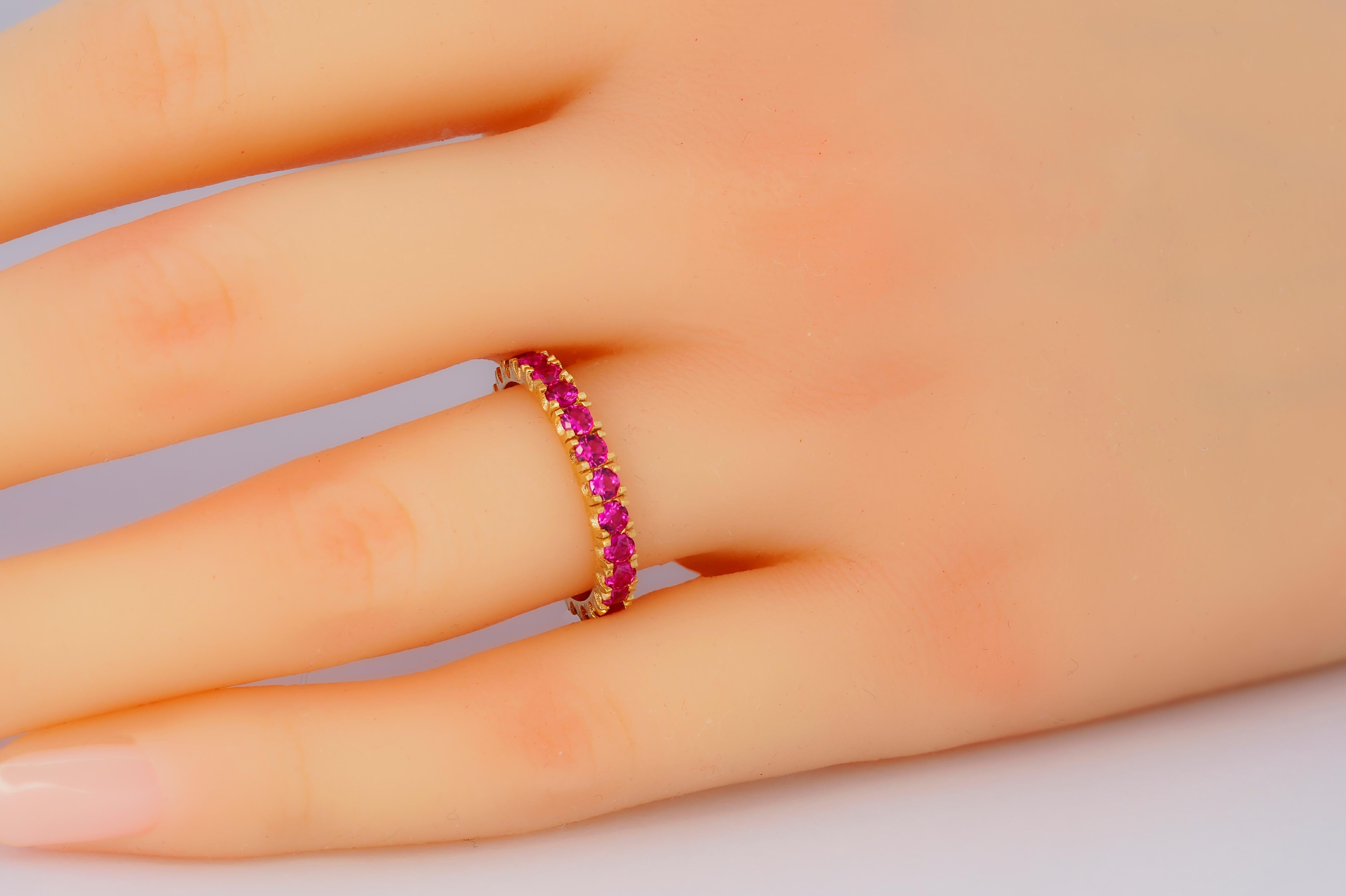 Modern Pinkish red gemstone 14k gold eternity ring band For Sale