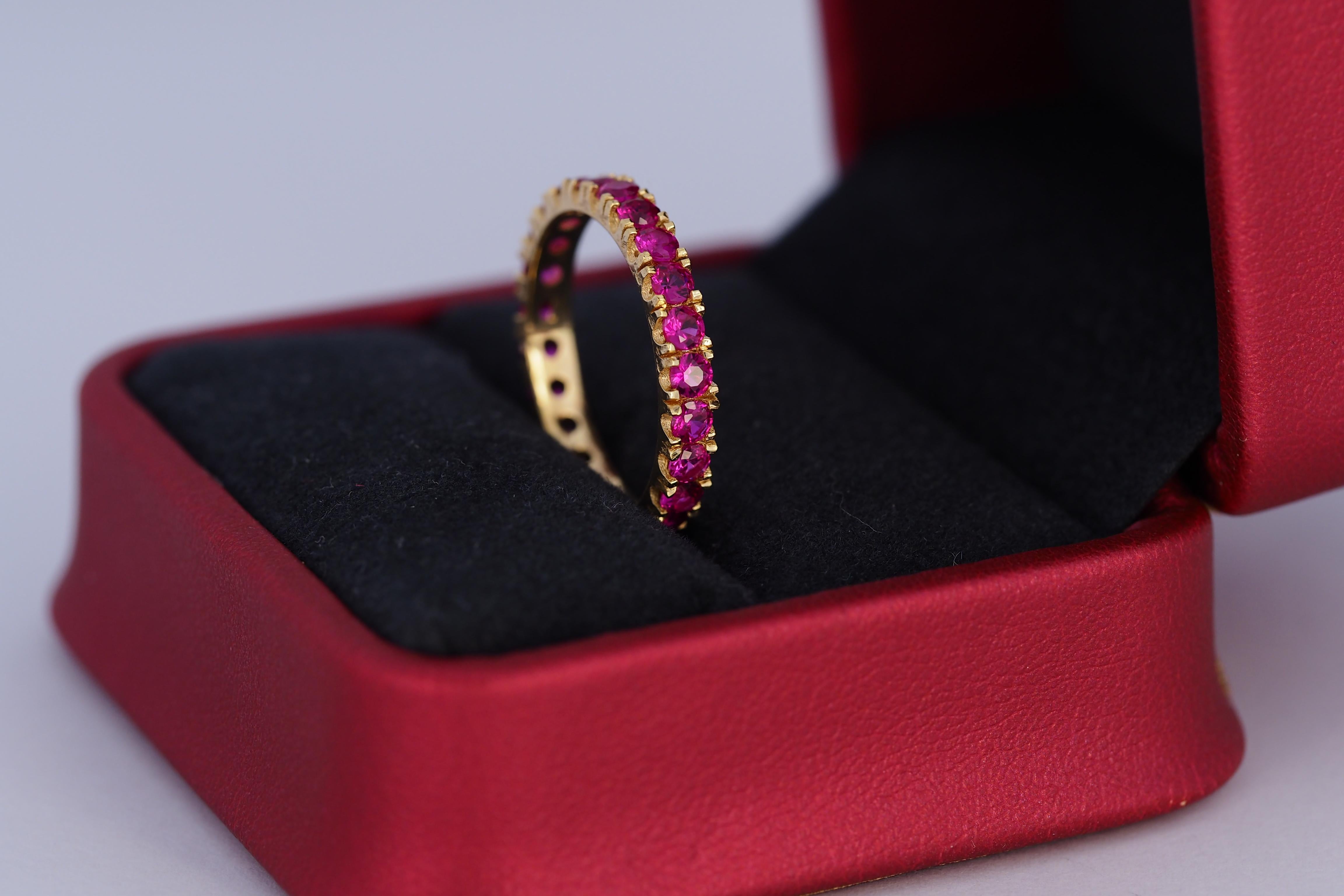 Round Cut Pinkish red gemstone 14k gold eternity ring band For Sale