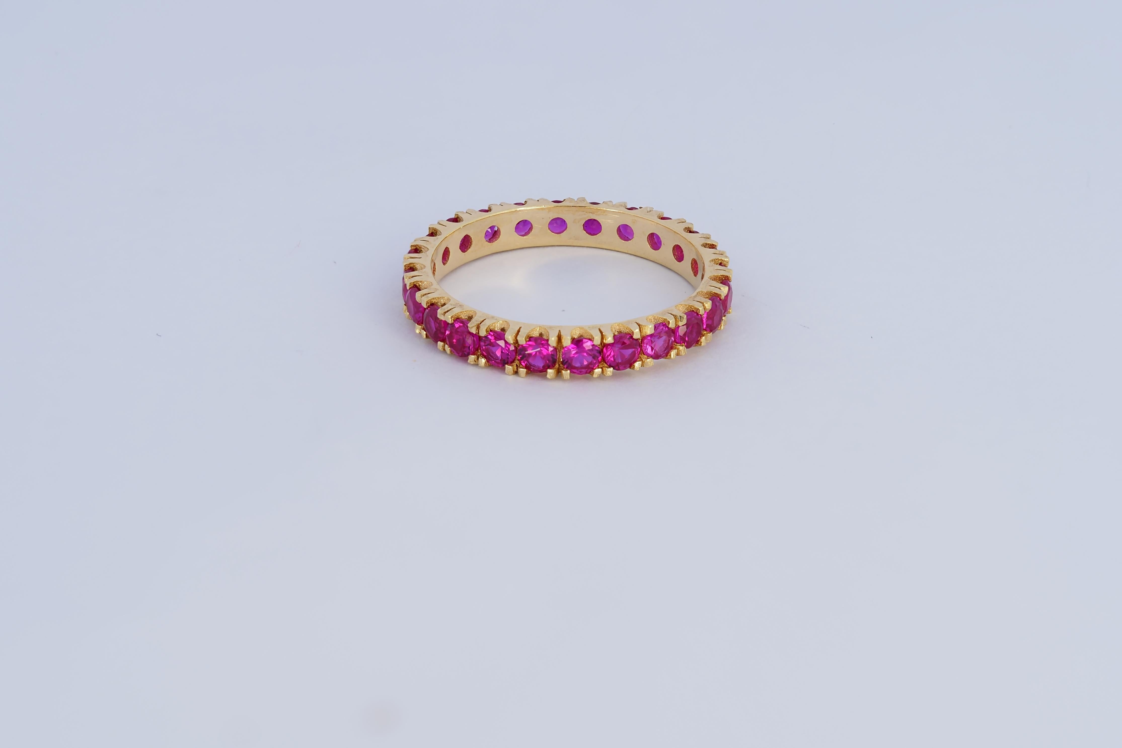 Pinkish red gemstone 14k gold eternity ring band For Sale 1