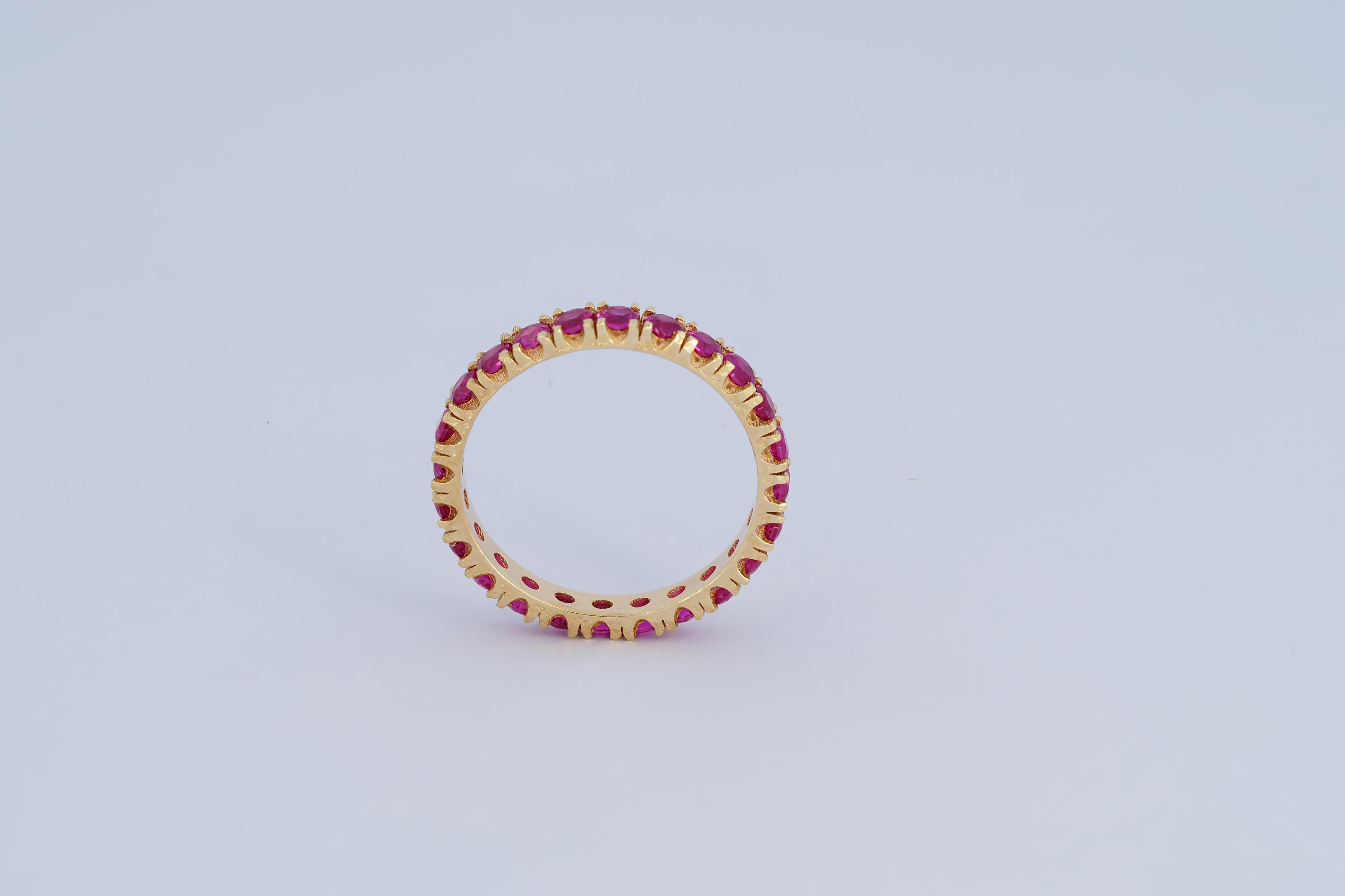 Pinkish red gemstone 14k gold eternity ring band For Sale 2