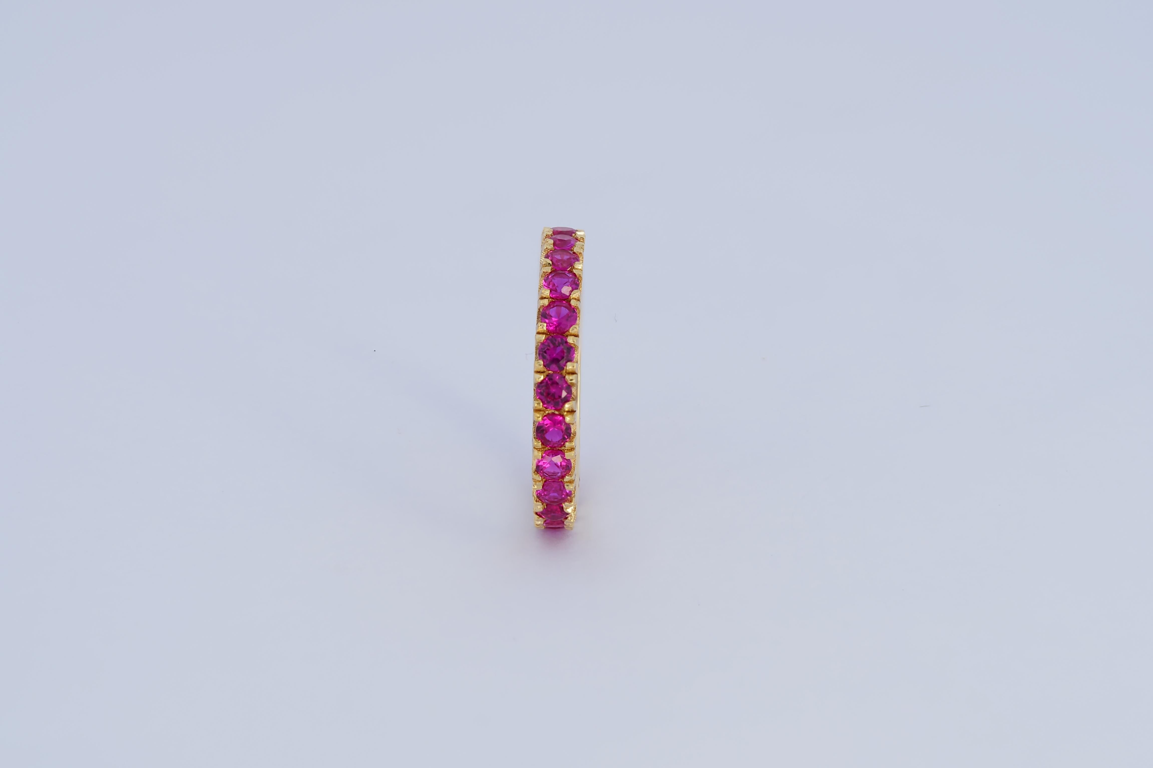 Pinkish red gemstone 14k gold eternity ring band For Sale 3