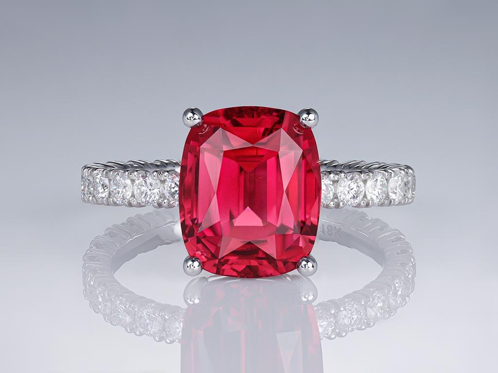 Introducing the epitome of elegance: our 4.30 carat Pinkish-Red Tourmaline Rubellite ring. Crafted to perfection, this stunning piece features a stylish cushion-cut shape, accentuating the rich hue and vibrant play of the exquisite