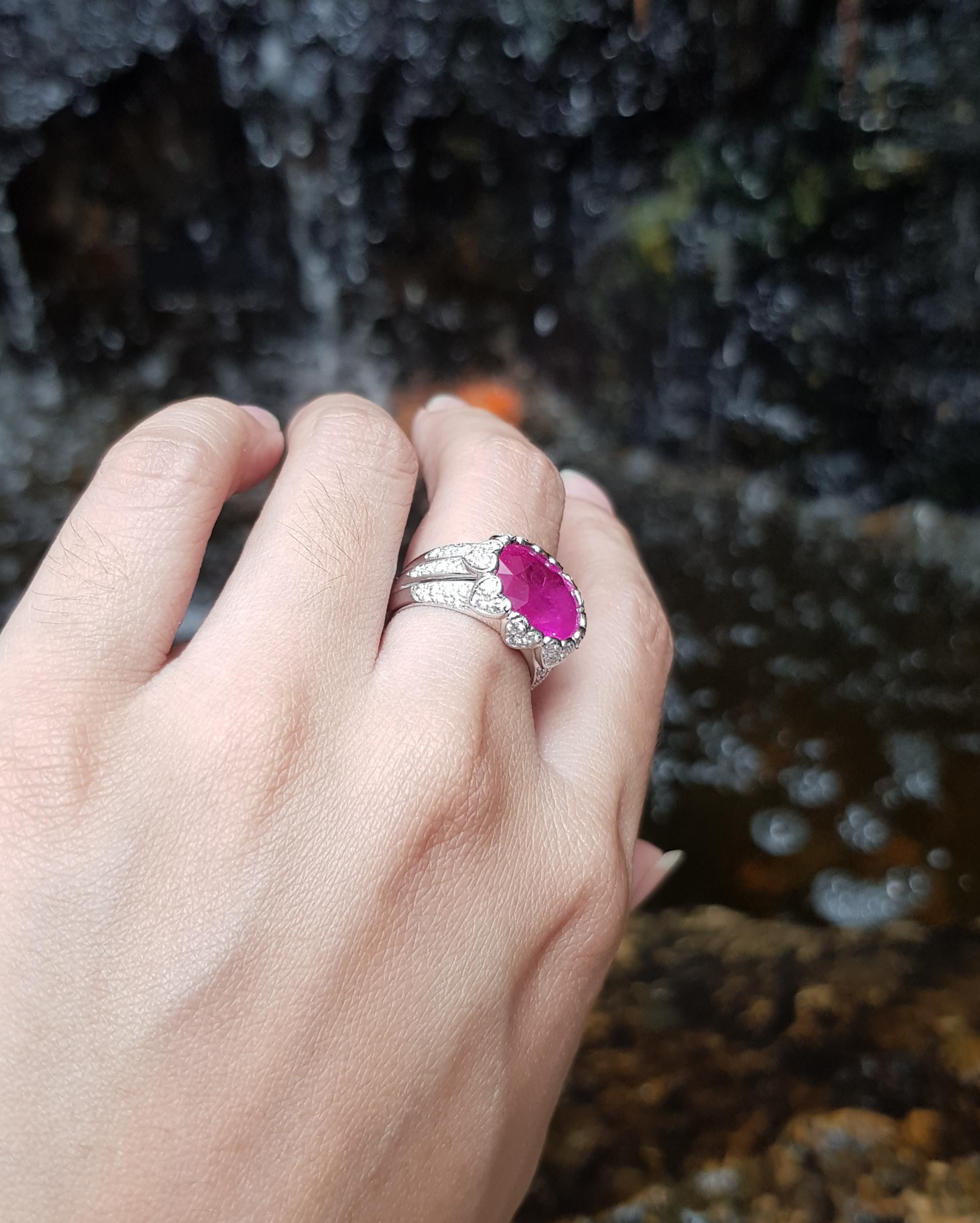 Oval Cut Pinkish Ruby with Diamond Ring set in 18 Karat White Gold Settings For Sale