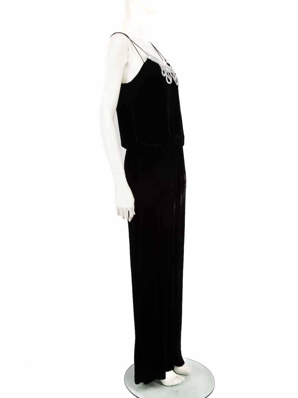 CONDITION is Very good. Hardly any visible wear to jumpsuit is evident on this used Pinko designer resale item.
 
 
 
 Details
 
 
 Black
 
 Velvet
 
 Jumpsuit
 
 Sleeveless
 
 V neckline
 
 Silver butterfly detail
 
 Elasticated waistline
 
 Back