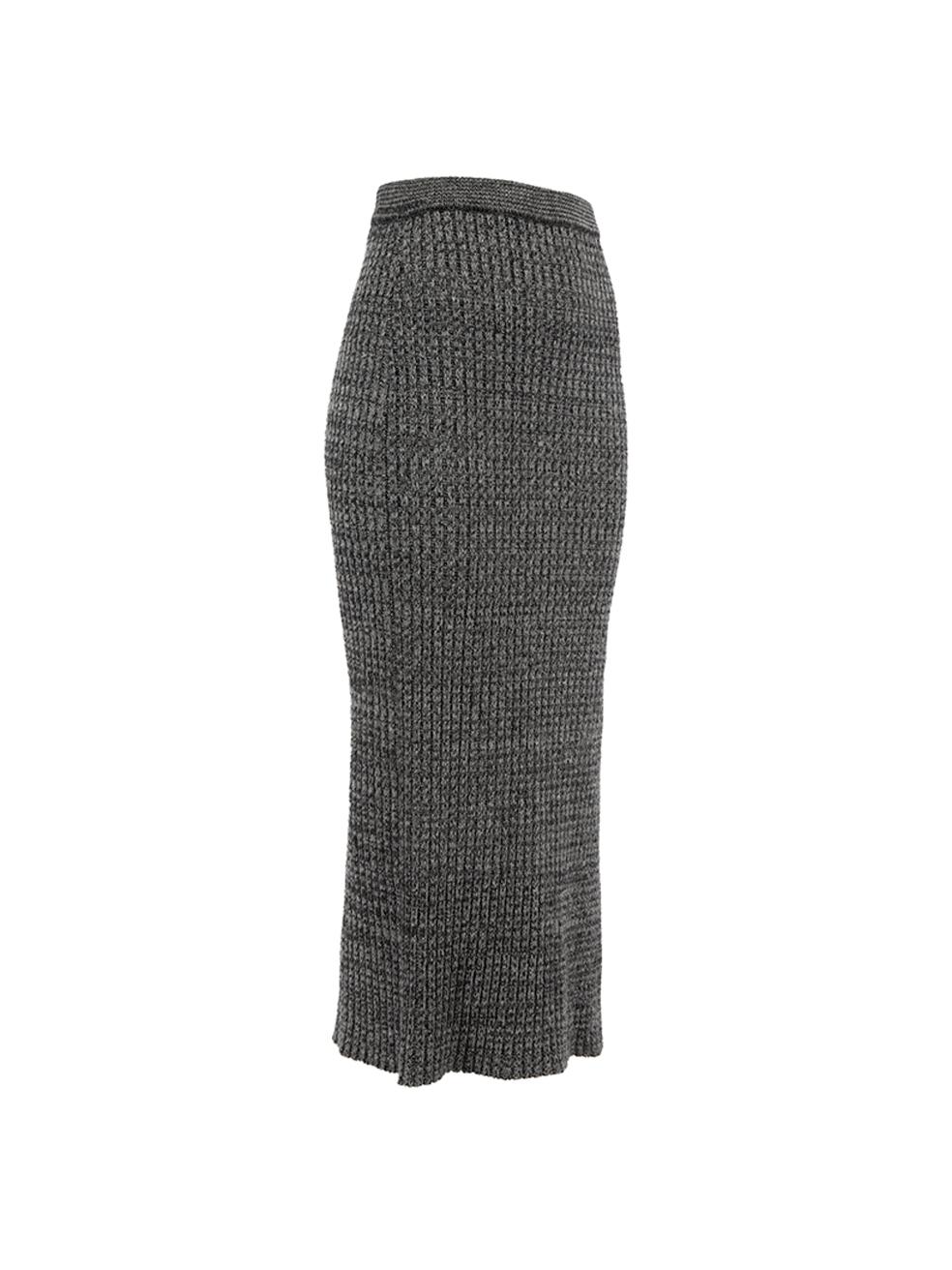 CONDITION is Very good. Minimal wear to skirt is evident. Minimal wear and pilling to the outer fabric on this used Pinko designer resale item.   Details  Grey Synthetic Knit skirt Midi length Side slit   Made in Italy  Composition 50% Polyamide,