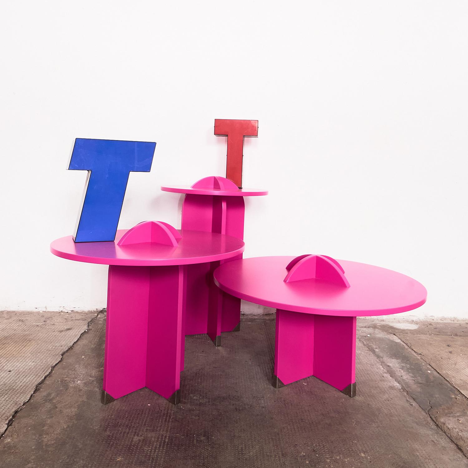 Part of the F4 Collection of three small tables in different sizes and heights, this wooden side table will elevate any contemporary setting with its glamorous look marked a vivid fuchsia lacquer inspired by the iconic shade associated with punk