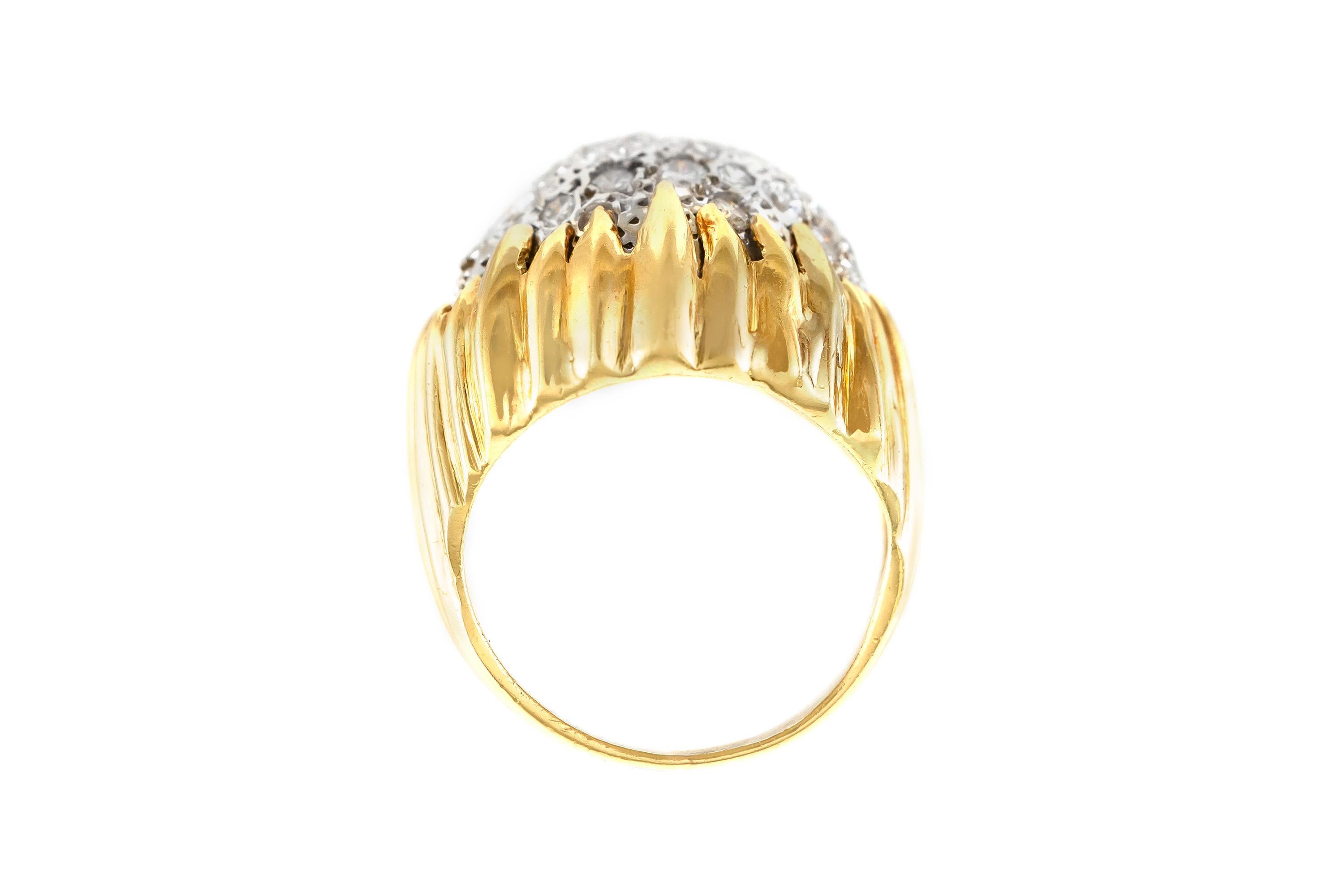 The ring is finely crafted in 18k yellow gold with diamonds weighing approximately 2.00 carat.
Can be resized .
Circa 1960.
