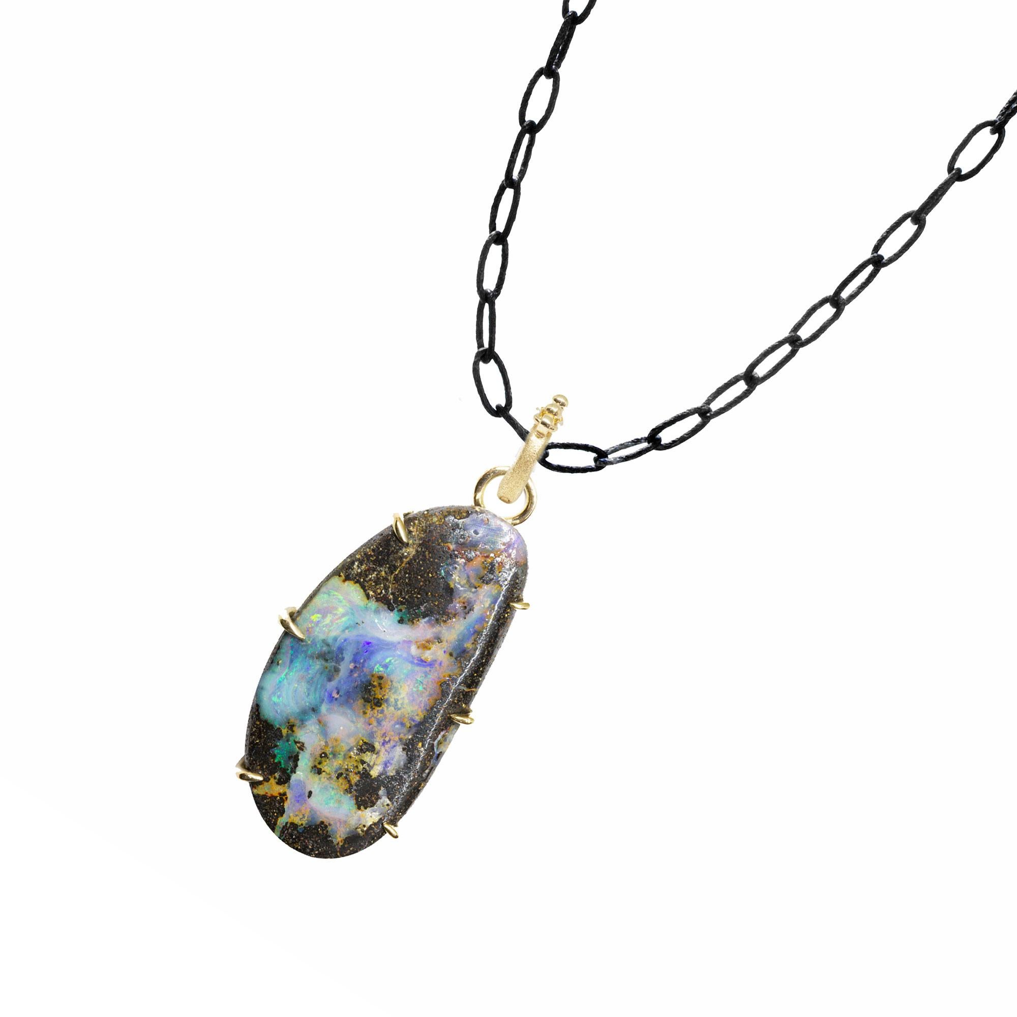 The black oxidized sterling silver neckalace chain is the perfect fit to showcase the vibrant pinnacle boulder opal pendant, the Pinnacle Medium Boulder Opal Silver Necklace is bold and brilliant, a gorgeous style you can dress up or down on the