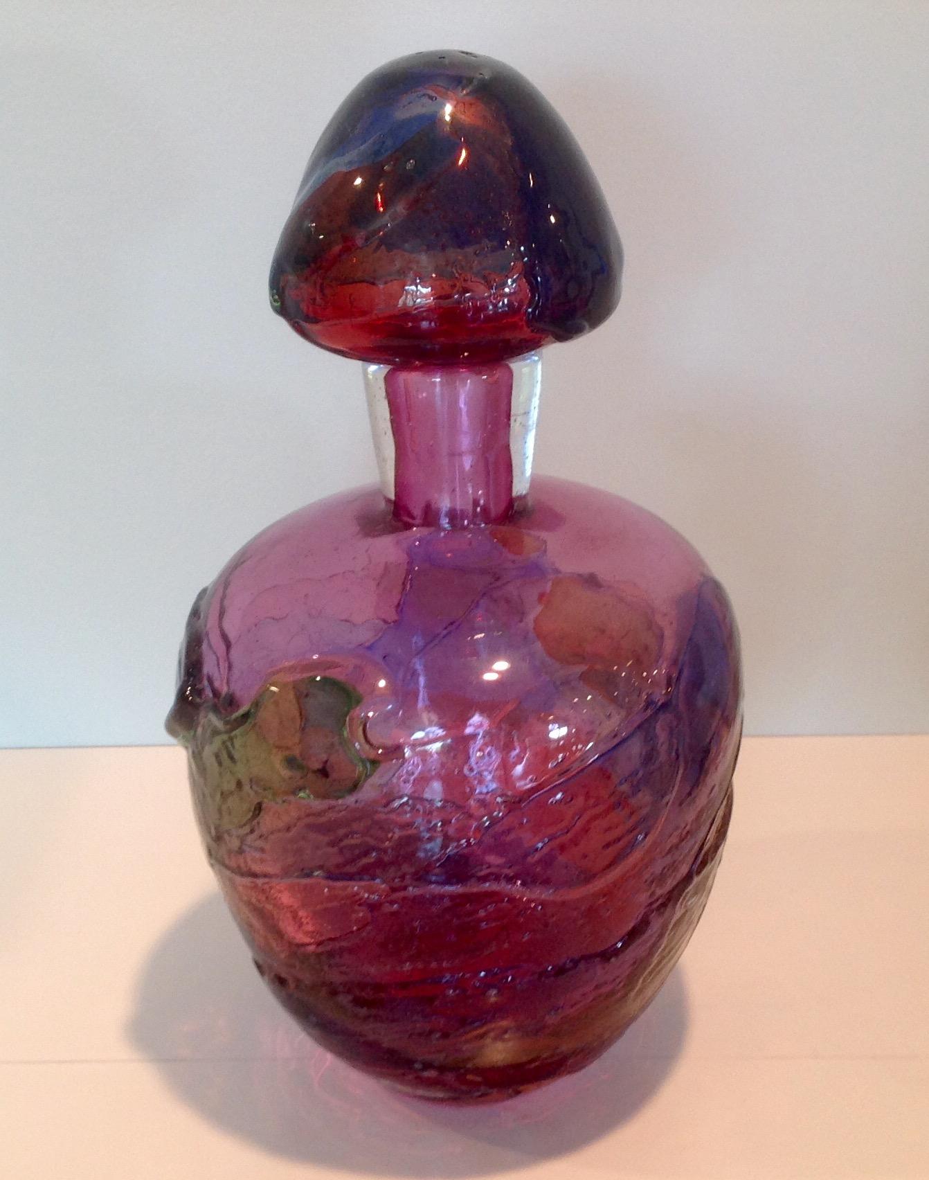 Amazing Mid-Century Modern decanter by Pino Signoretto. Large and solid form with amazing color. 

Pino Signoretto was born in 1944 in a small town near Venice and in 1954 began working at a chandelier glassworks. In 1959 he learned from the great