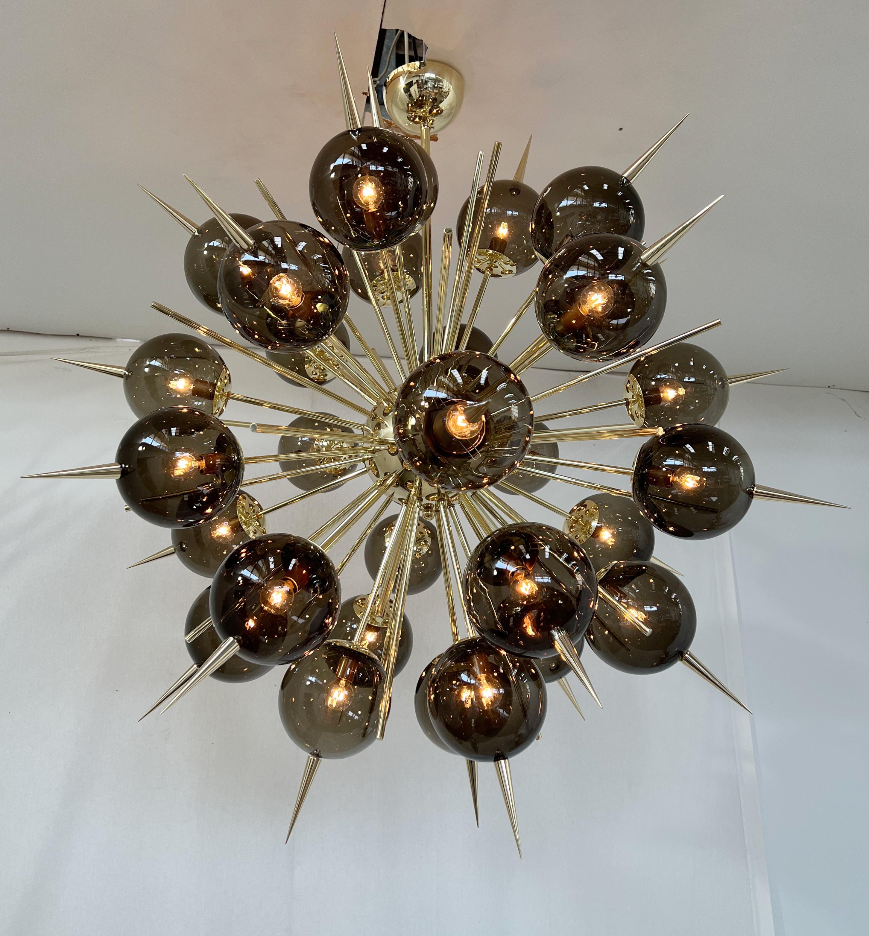 Ottone Lampadario Pinocchio di Fabio Ltd in vendita