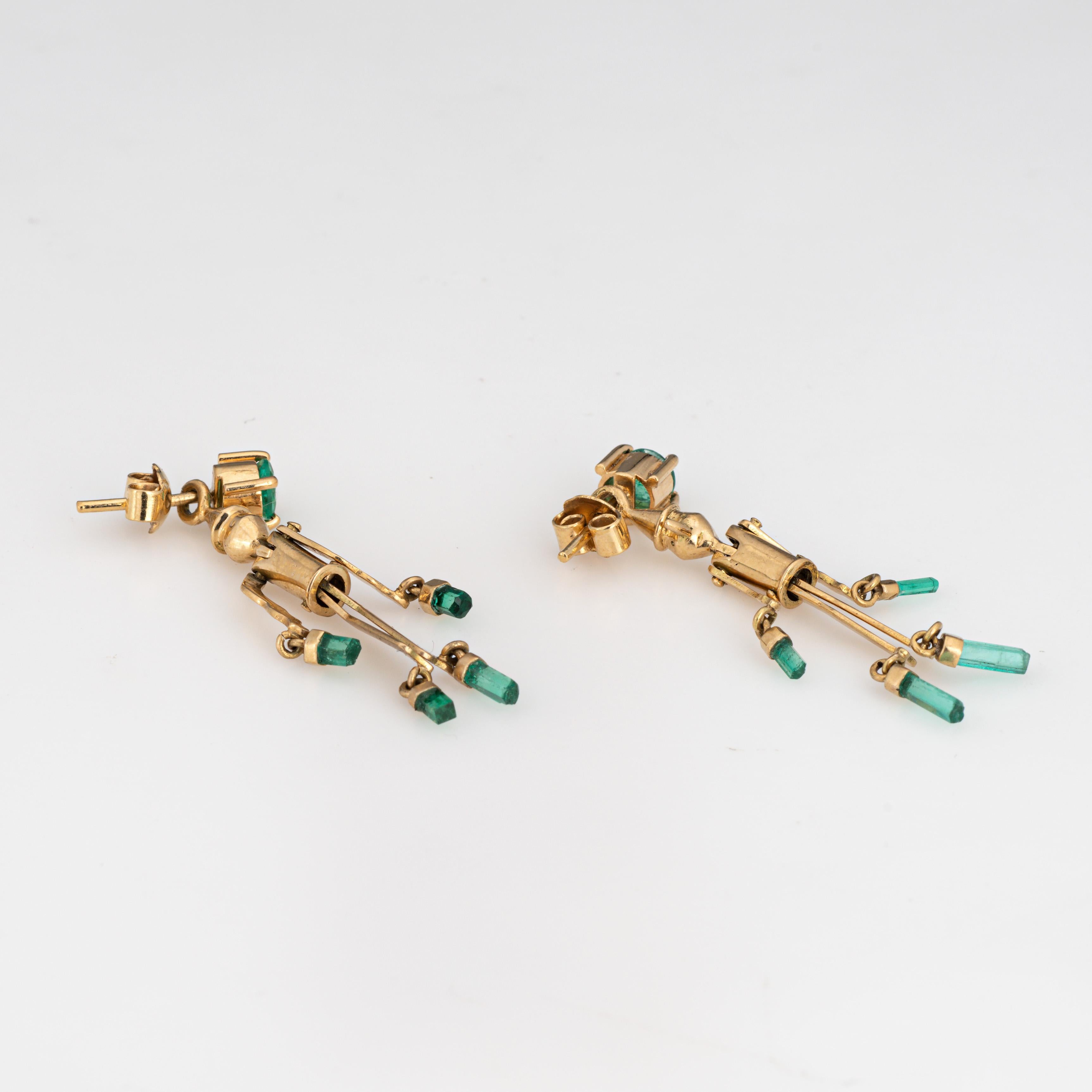 Fun pair of Pinocchio emerald earrings crafted in 18k yellow gold. 

Natural emeralds total an estimated 1.40 carats. Note: one emerald to the base is shorter than the others (see images) 

Featuring the beloved Italian storybook character, who was
