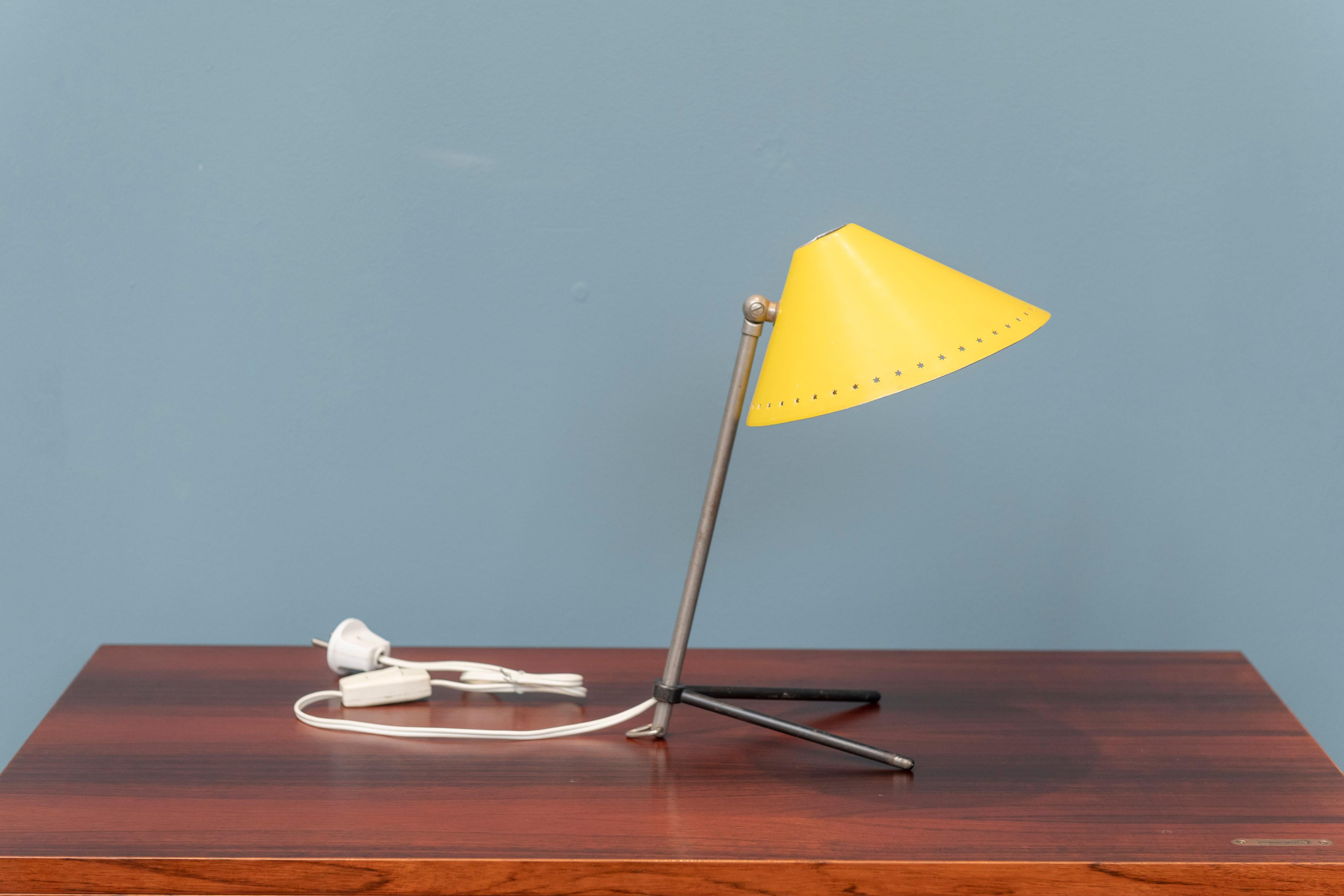 Elegant and stylish table or wall lamp for Dutch lighting company Hala. Tripod base adjustable in height and angle. Minimalistic, beautiful and well thought out designed lamp in very good original condition.