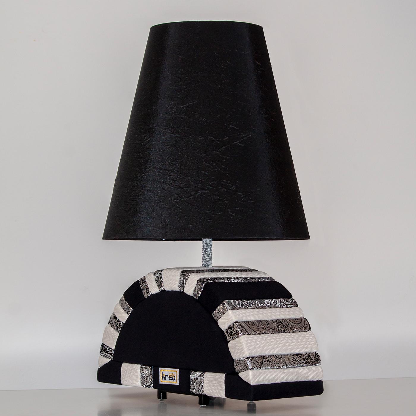 Paying tribute to their Sardinian heritage, designer Francesca Fiori created this exquisite table lamp featuring the distinctive geometric pattern of the 