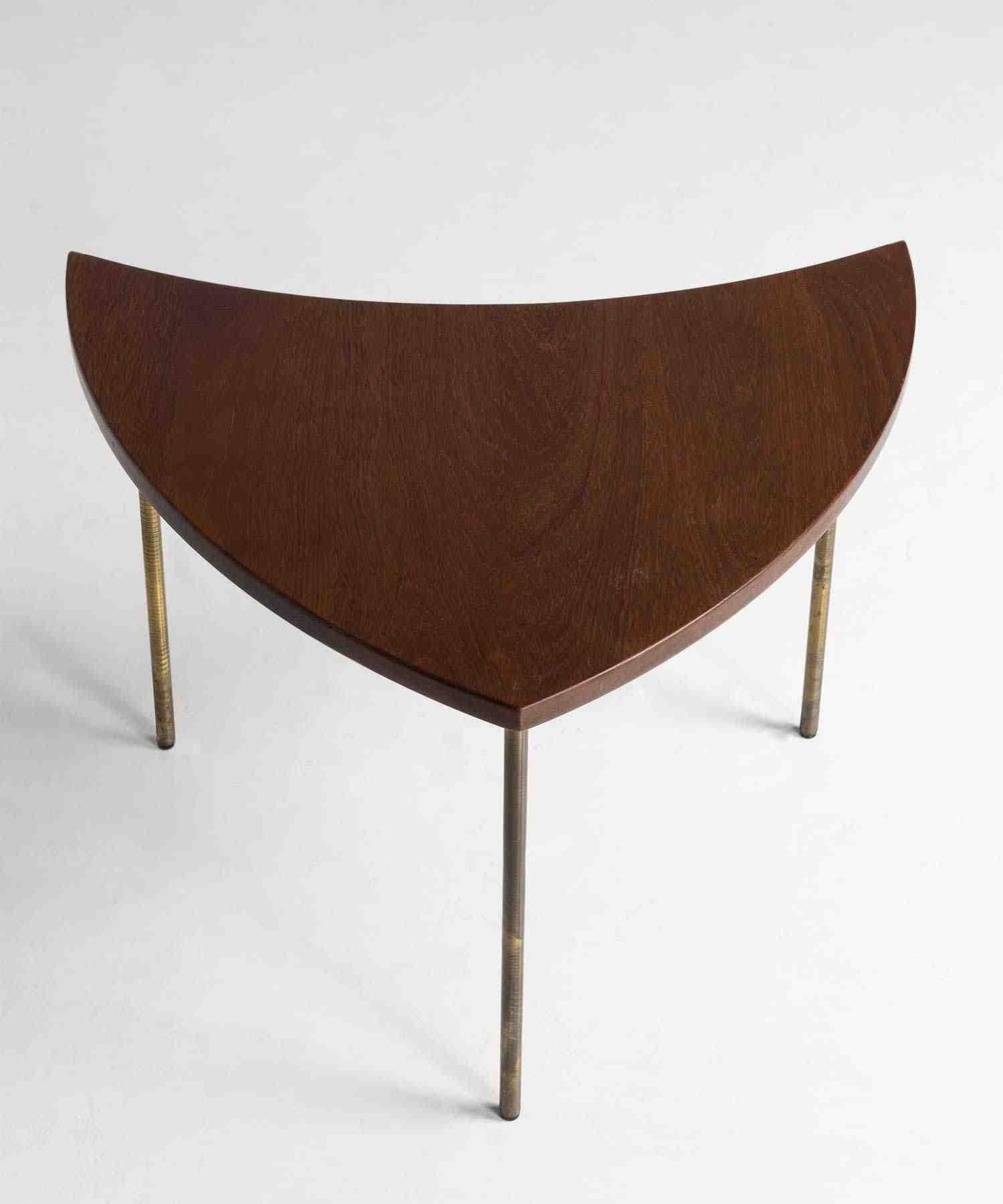 Pinwheel table by Peter Hvidt,

Denmark Circa 1960,

Series of six Model 523 tables with solid teak top on brass legs. Designed by Peter Hvidt and Orla Mølgaard-Nielsen. Can be configured in multiple ways.

Measures: 25.5” W x 18” D x 17.5” H